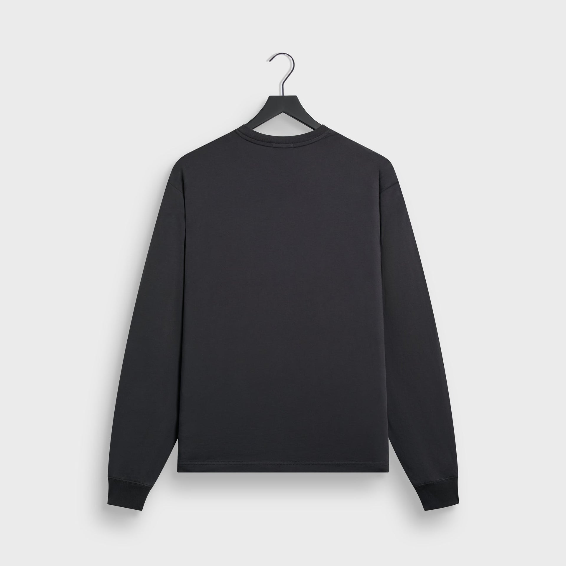 Kith Long Sleeve LAX tee in black cotton, back flat lay on hanger