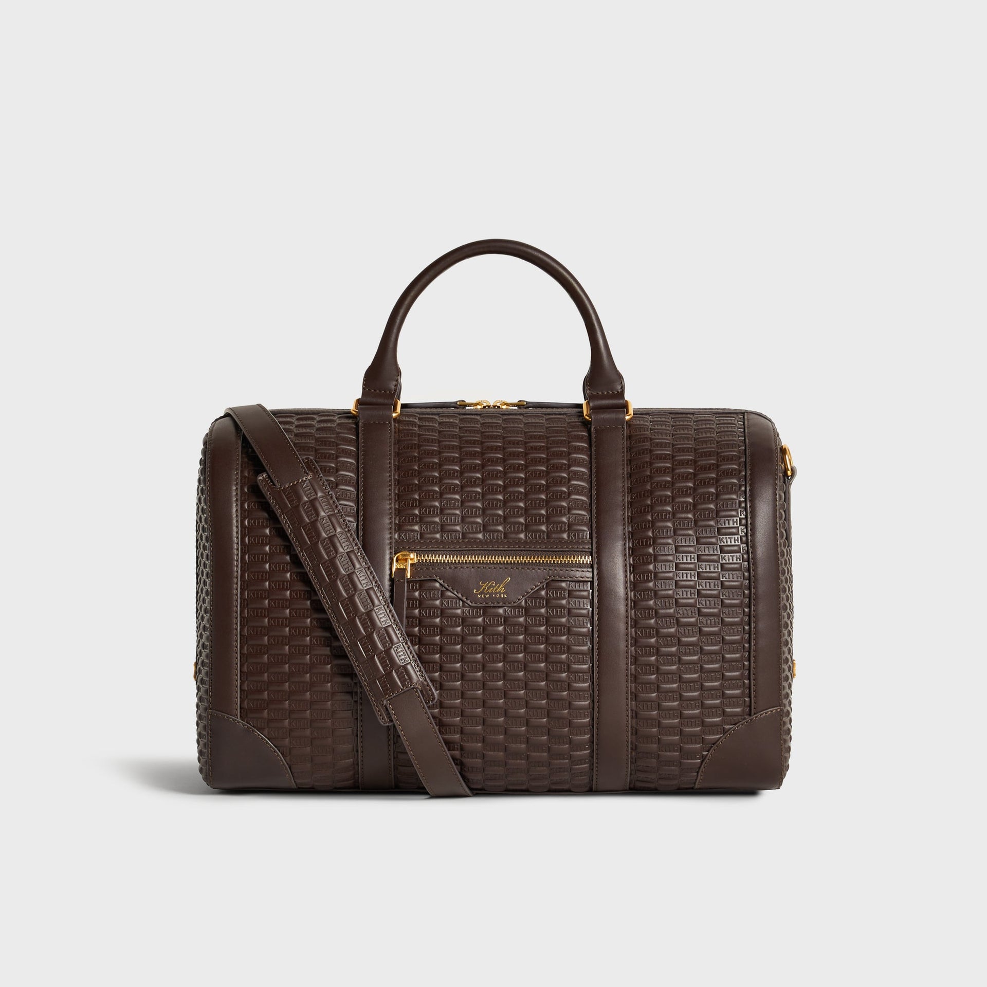 Kith Monogram Smooth Leather Traveler K40 Duffle Bag in Zoom brown, front view with crossbody strap draped across
