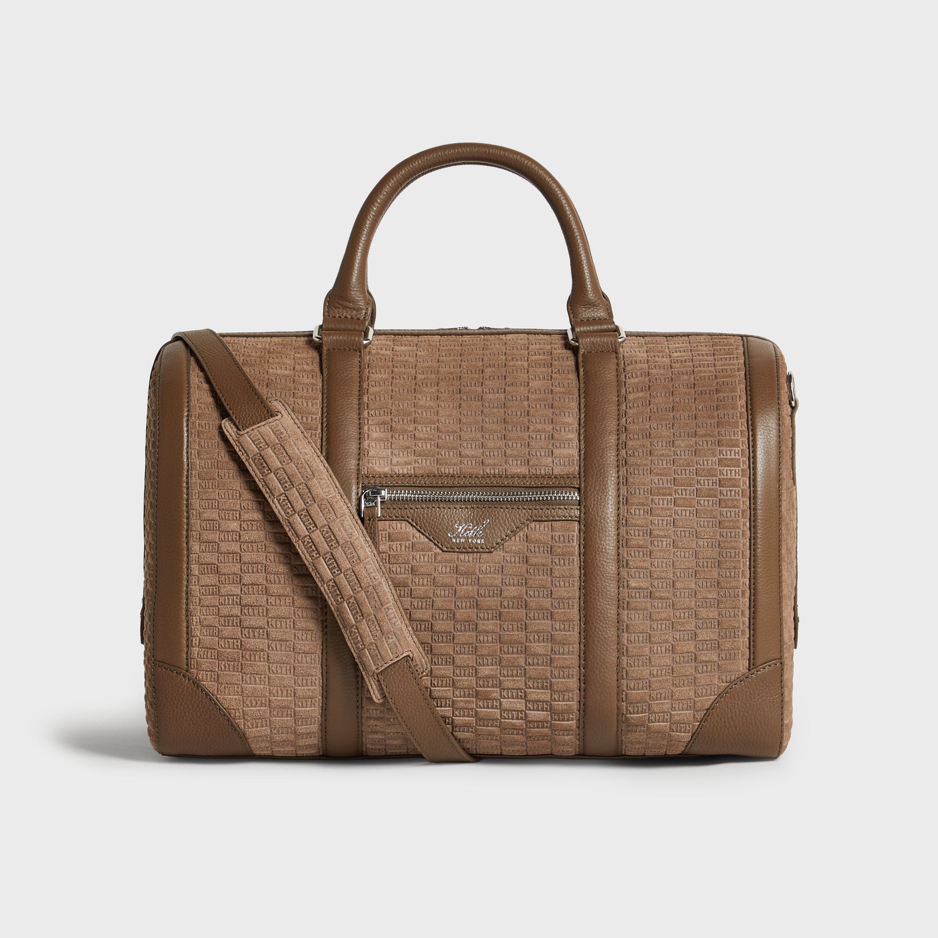 Kith Monogram Suede Traveler K40 Duffle Bag in Java, front view with leather handles and zip pocket