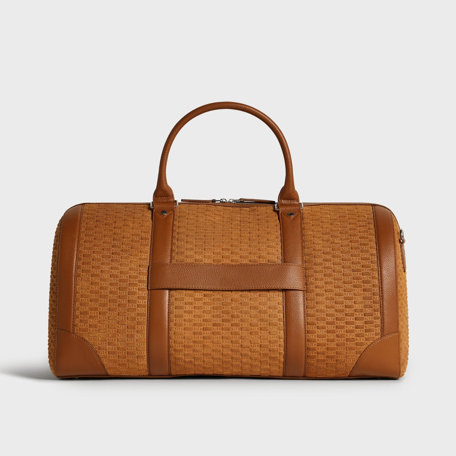 Kith Monogram Suede Traveler K55 Duffle Bag in Argil, back view showing woven KITH suede panel and center strap