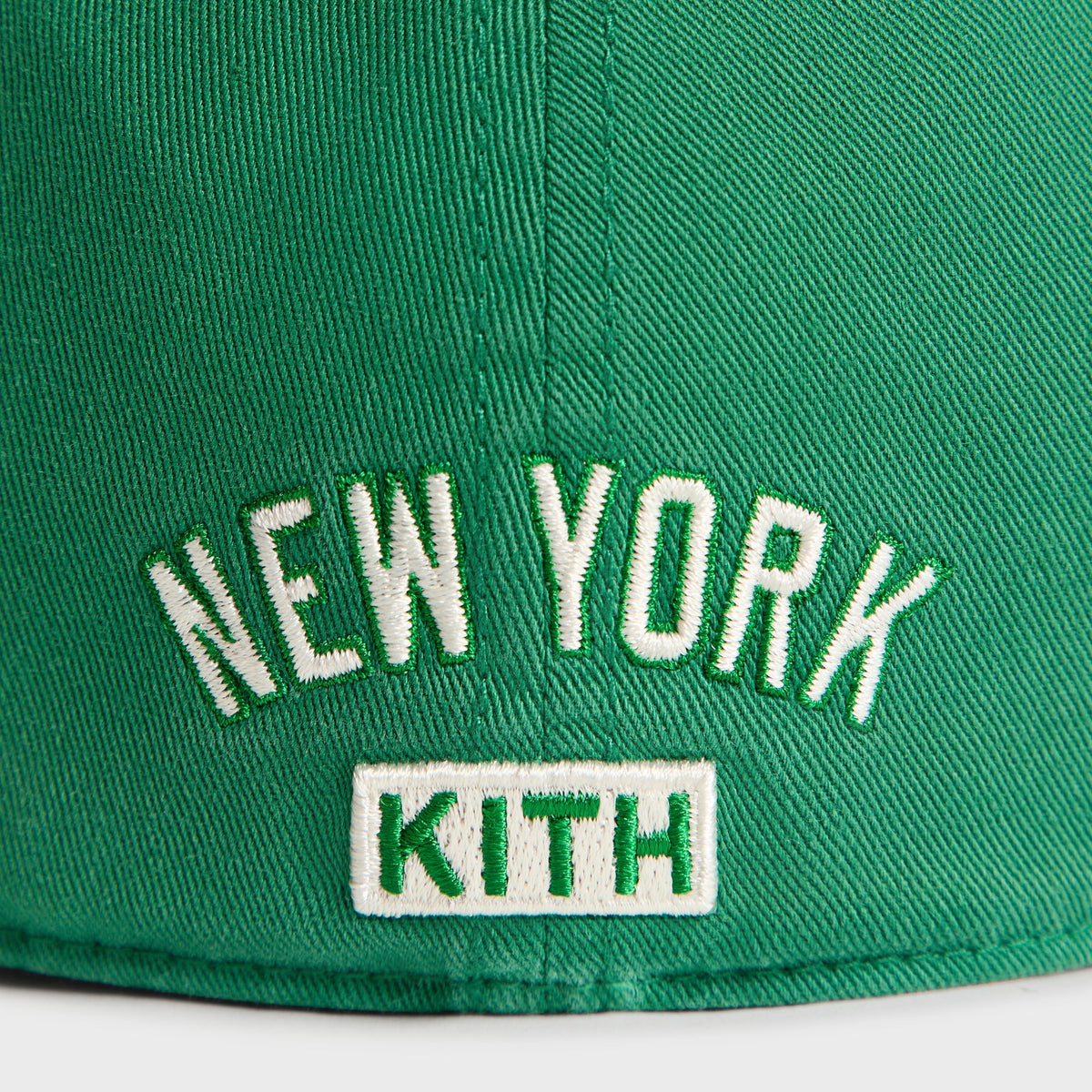 Kith & '47 Yankees cap in Kelly green - close-up detail of New York KITH text on back