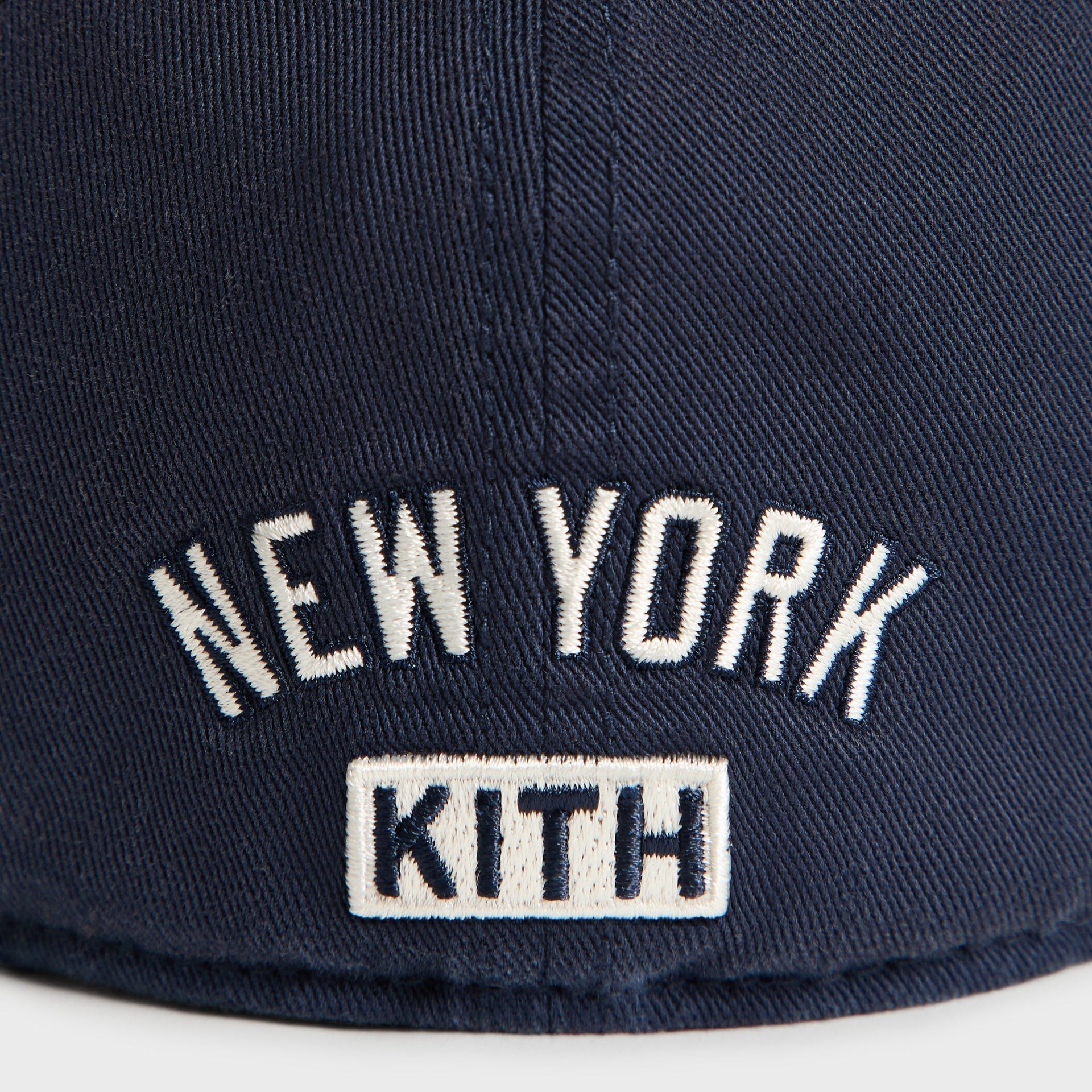 Kith & '47 Yankees cap in Nocturnal - close-up detail of New York KITH text on back