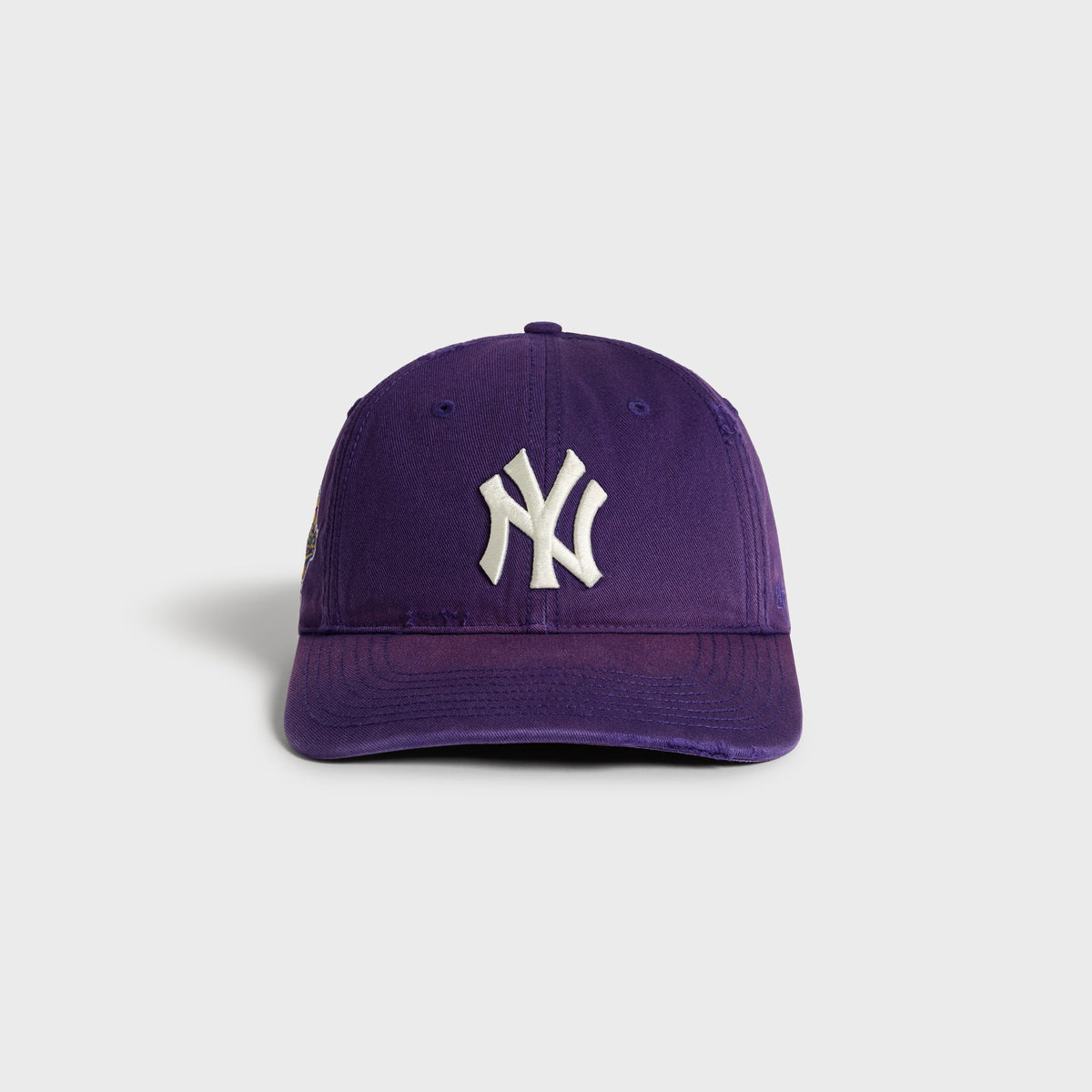 Kith & '47 Sun Faded Franchise LS Cap, Yankees, Solitaire purple colorway - front view with embroidered NY logo