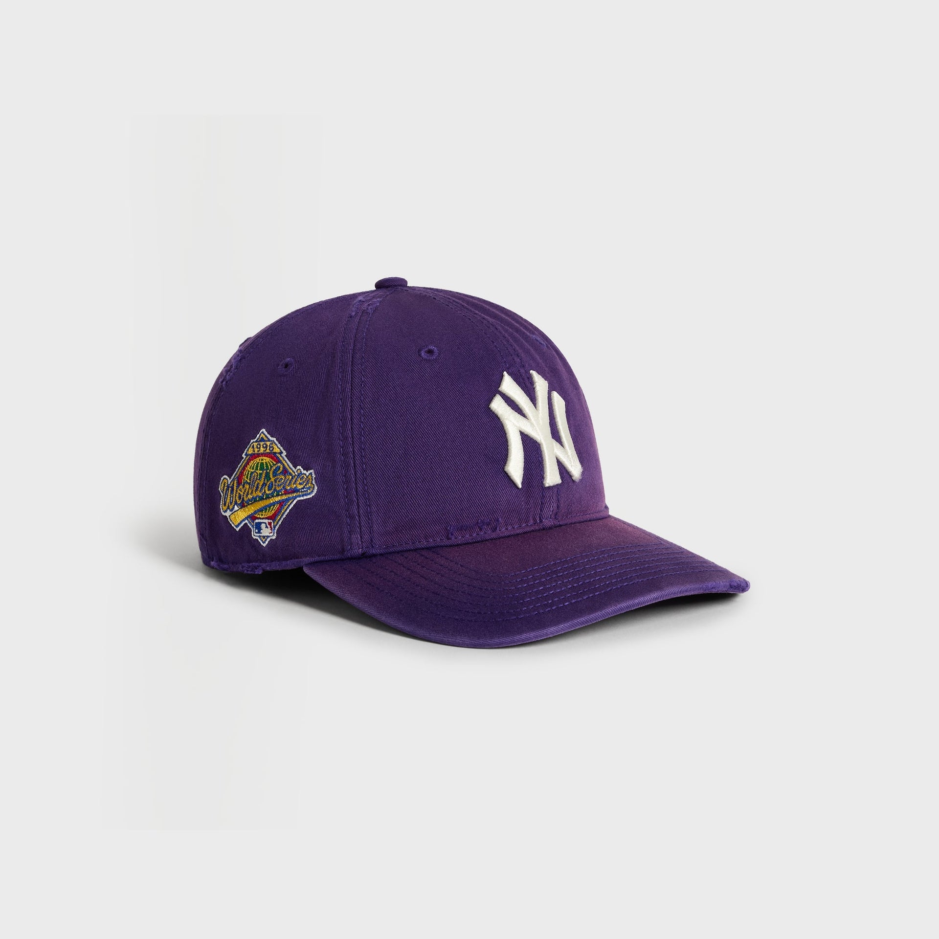Kith & '47 Yankees cap in Solitaire purple - 3/4 angle showing 1996 World Series side patch