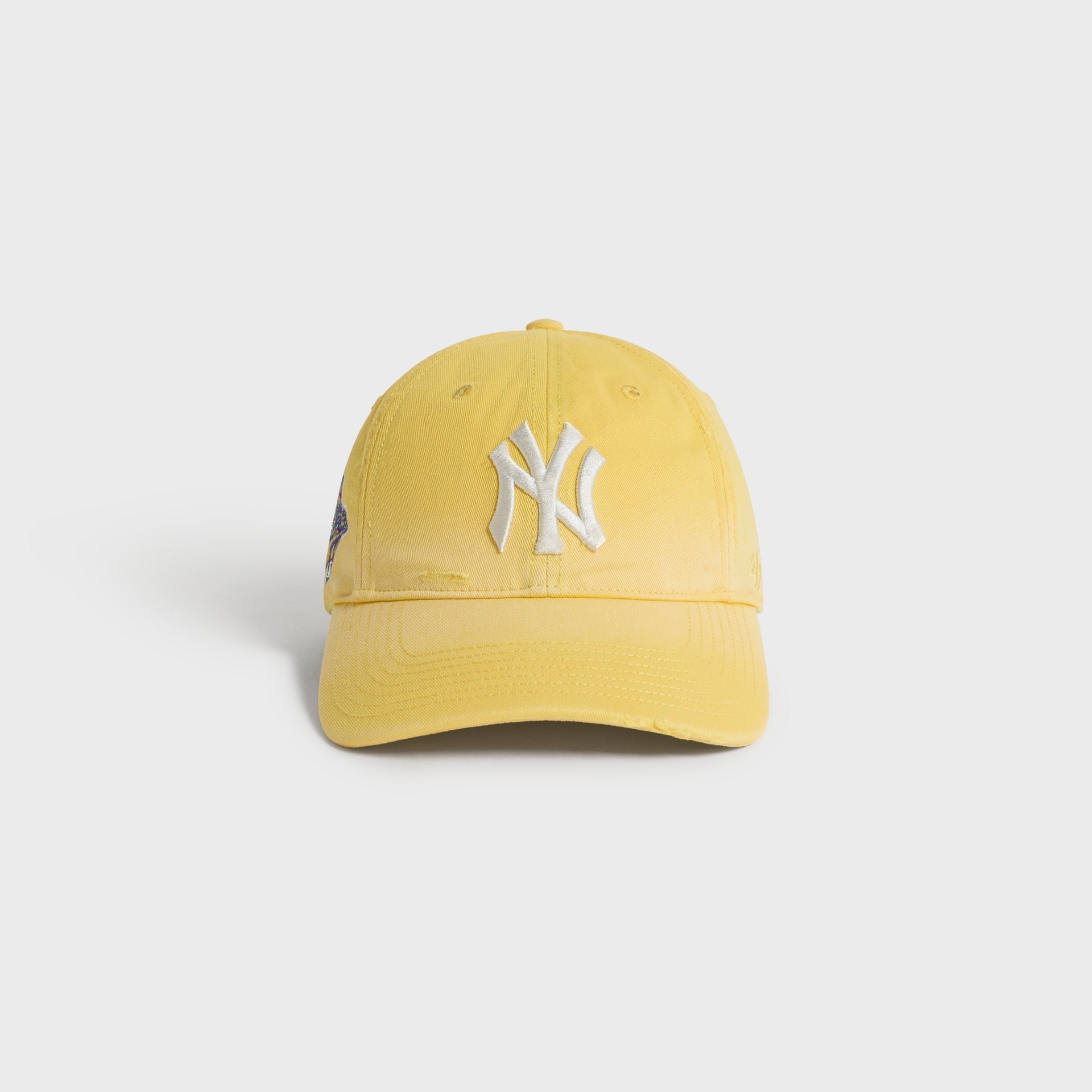 Kith & '47 Sun Faded Franchise LS Cap in Buzz yellow, front view with white NY logo