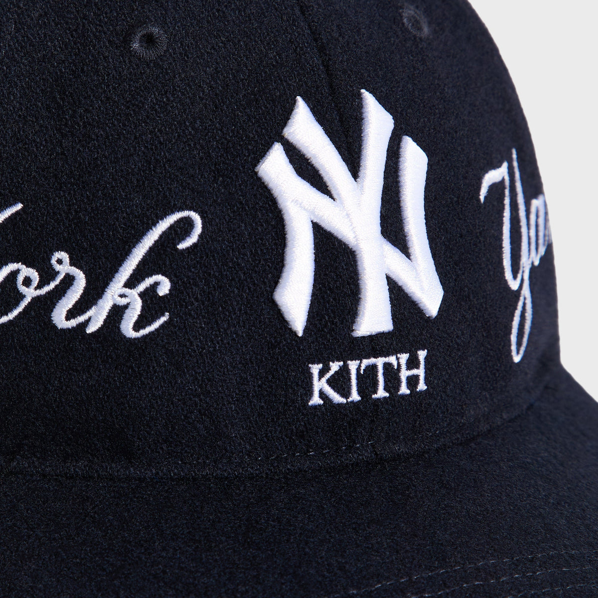 Kith & '47 Wool Clean Up Cap in Nocturnal - close-up detail of embroidered NY logo and Kith wordmark