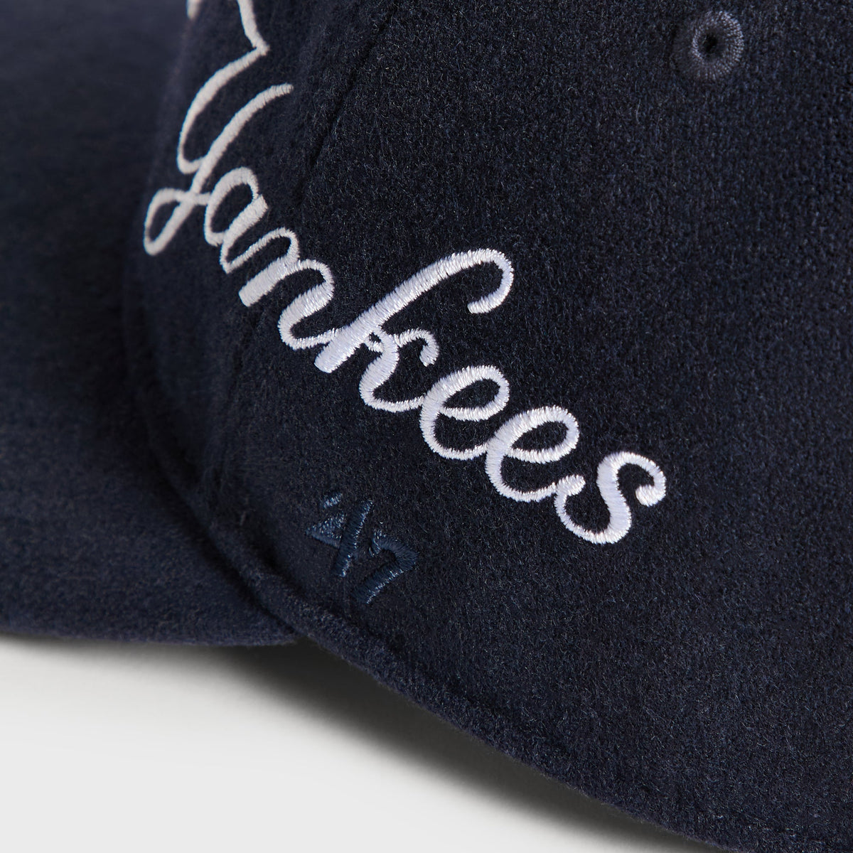 Kith & '47 Wool Clean Up Cap in Nocturnal - close-up detail of Yankees script embroidery on side