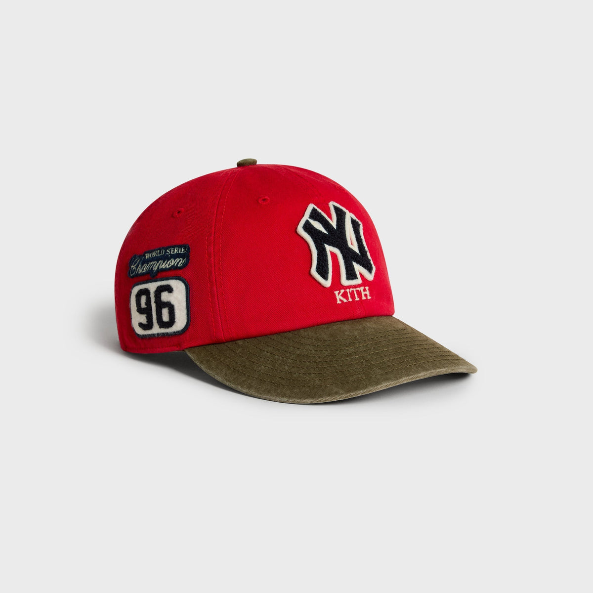 Kith & '47 Clean Up Round Visor Cap in Retro, angled view showing NY patch and World Series Champions patch