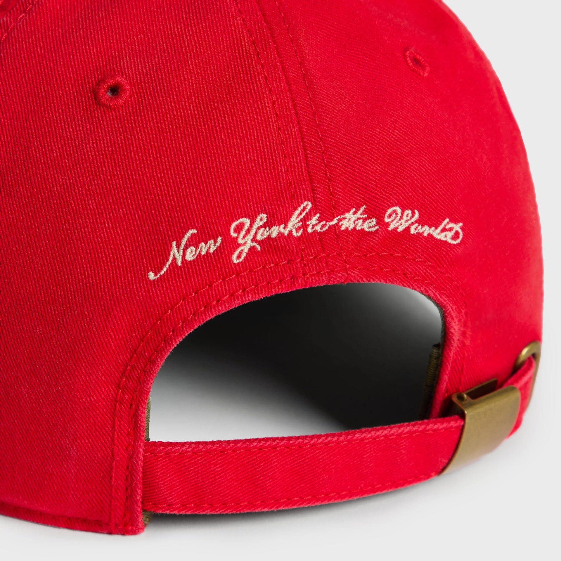 Close-up back detail of Retro cap showing New York to the World script embroidery