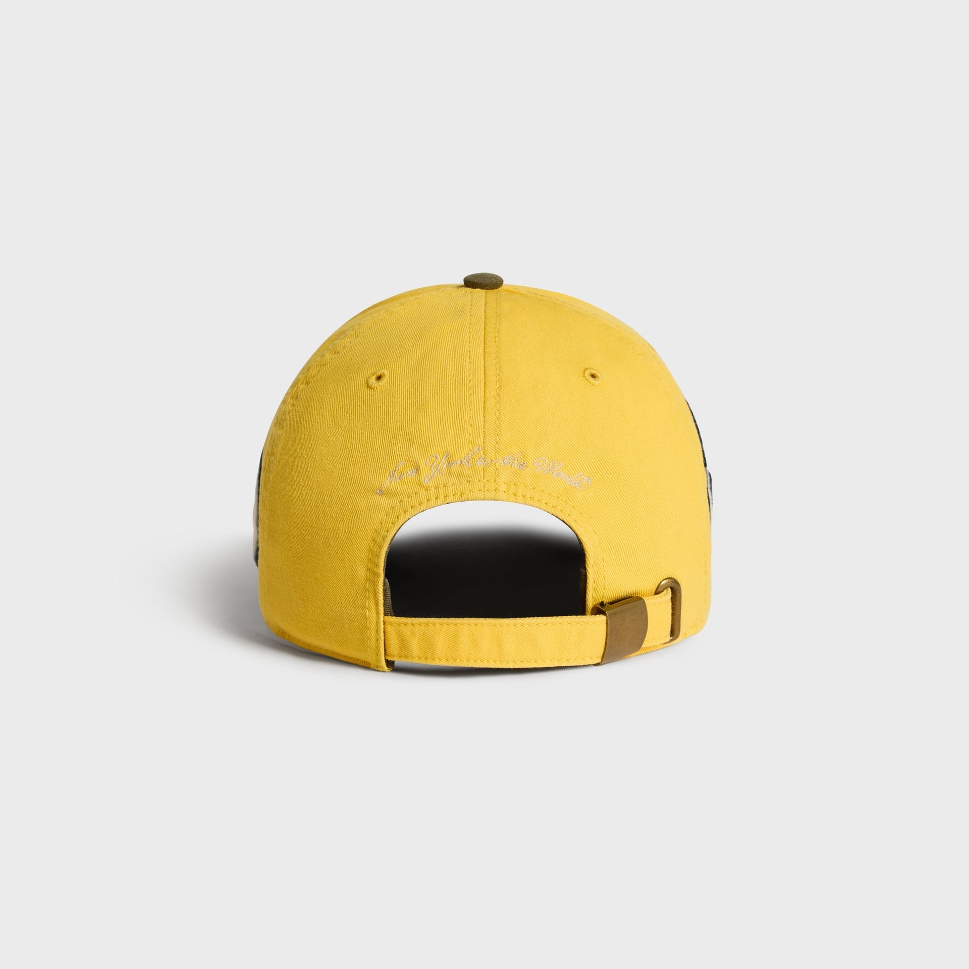 Kith & '47 Clean Up Round Visor Cap in Buzz, back view with New York to the World script embroidery