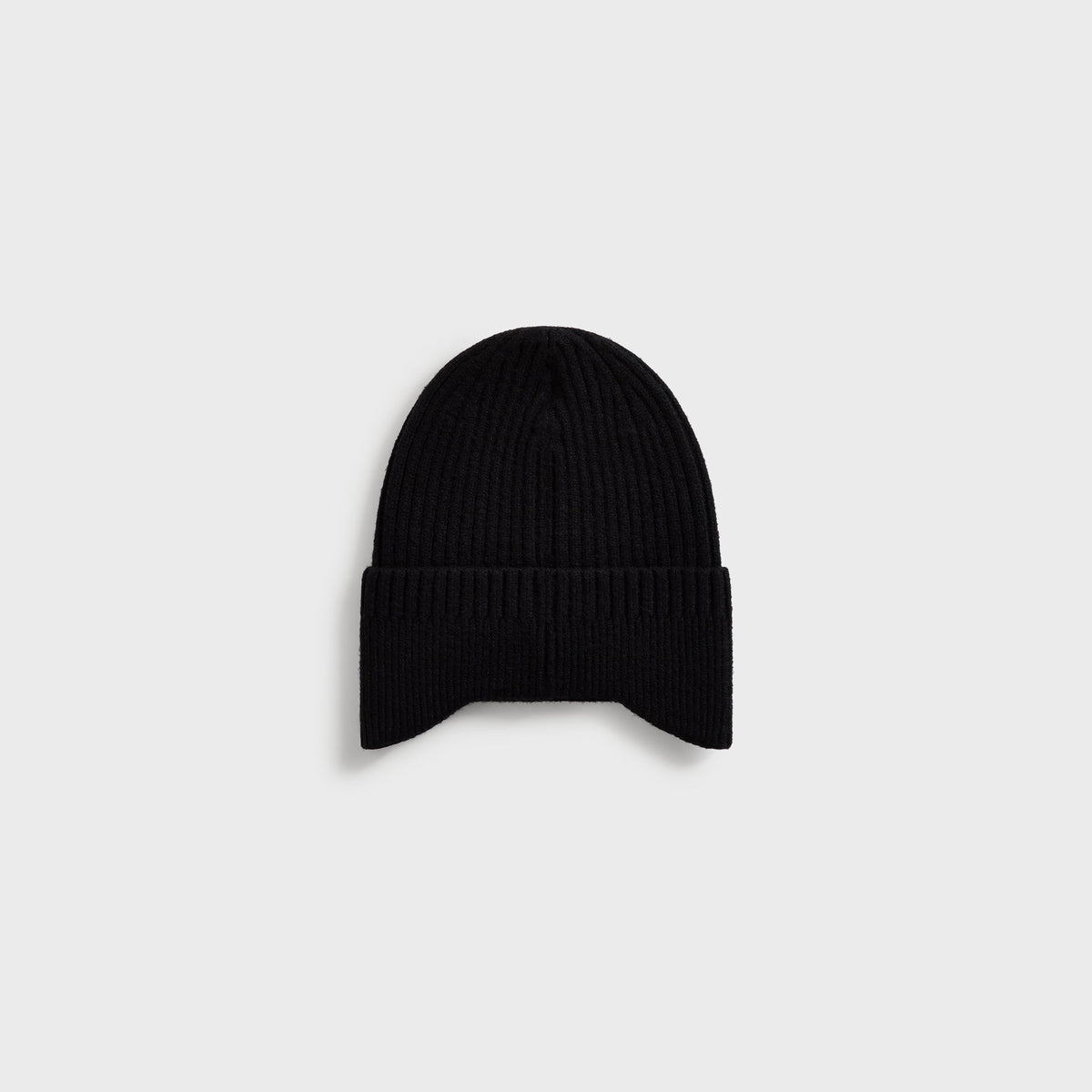 Kith Chunky Knit Earflap Beanie in black ribbed knit, back view