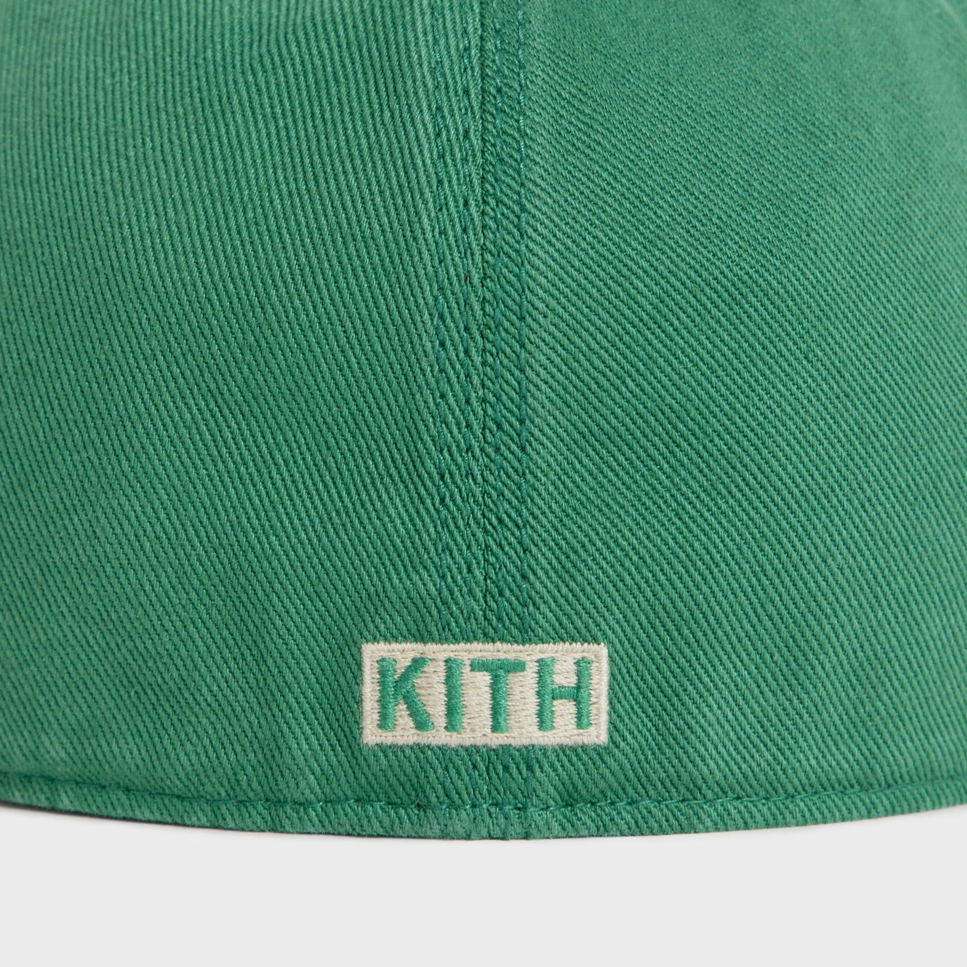 Close-up back detail of KITH box logo on Kelly Heavy Twill Franchise LS Cap
