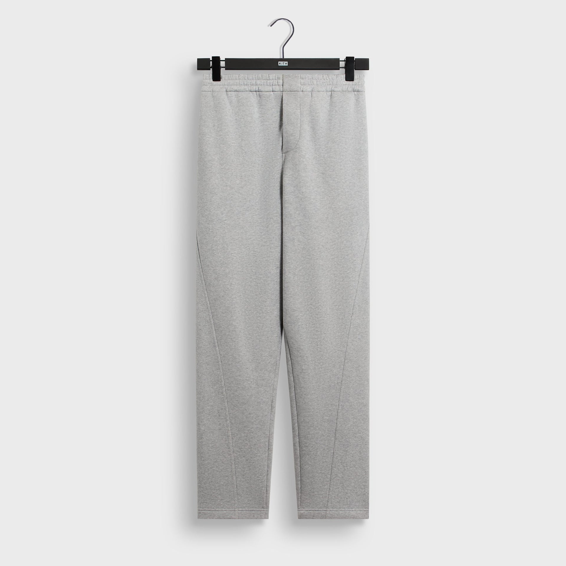 &Kin Plush Fleece Akita Sweatpant in medium heather grey, front view on KITH hanger with pintuck seams