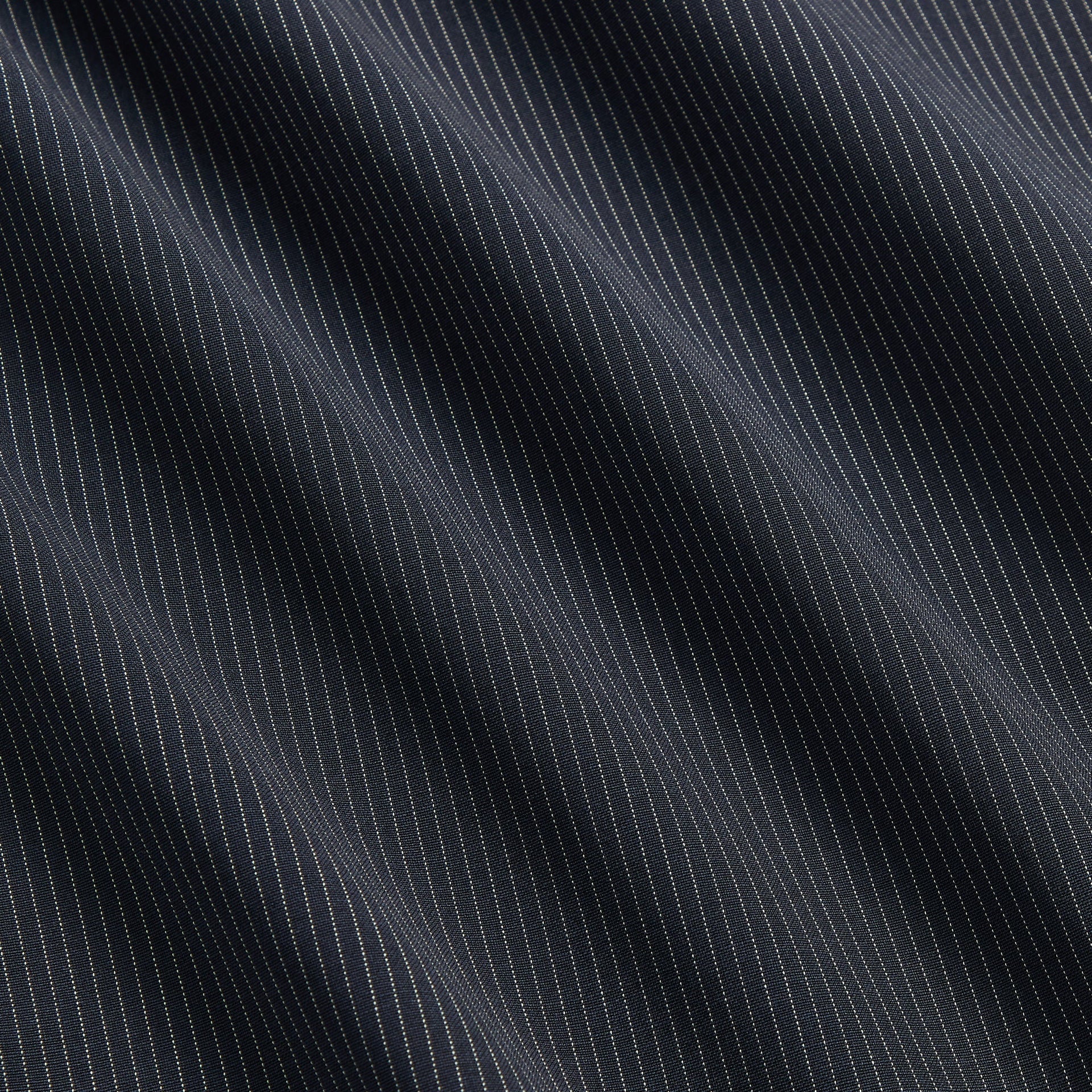 &Kin Idris Pant close-up of navy tropical wool pinstripe fabric