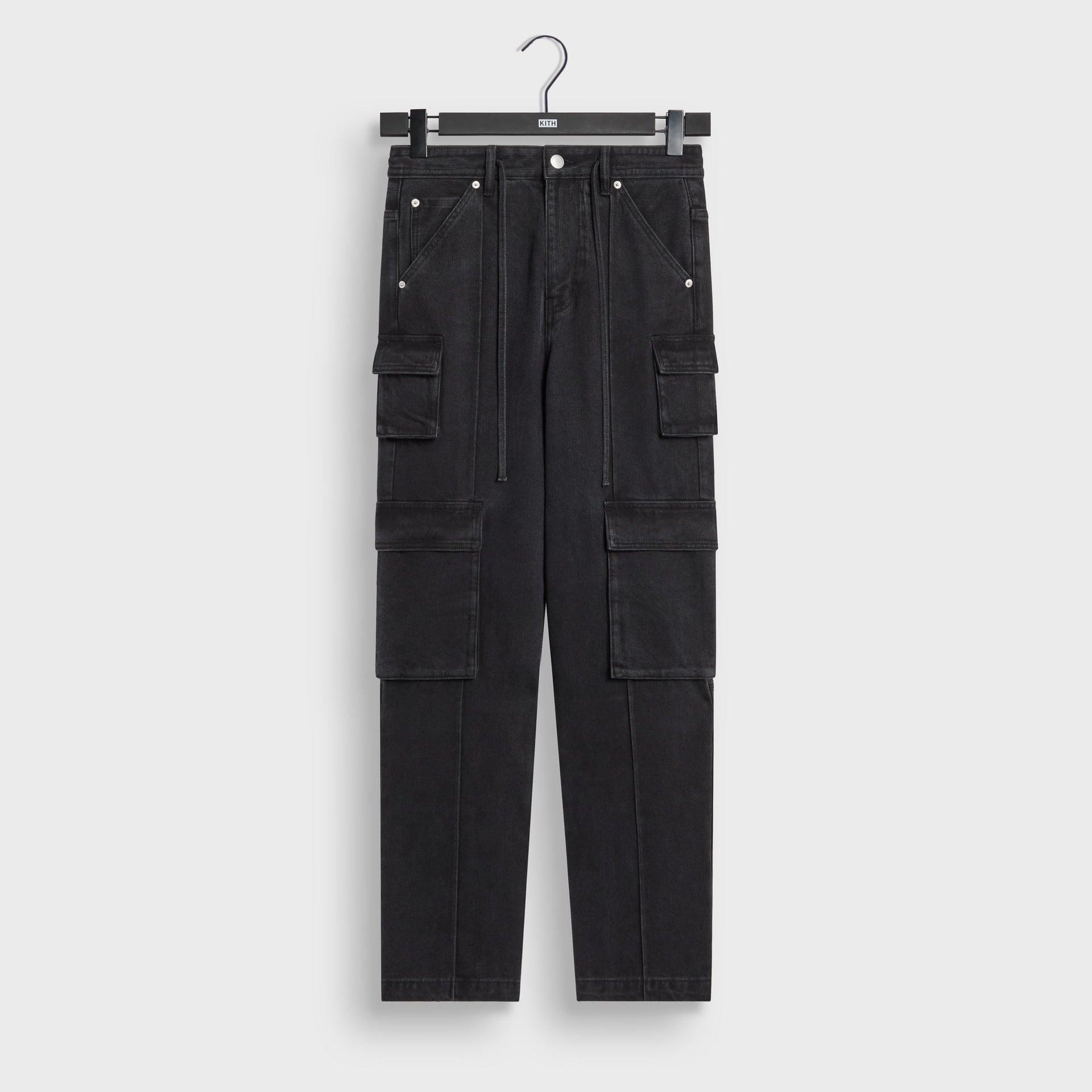 Kith Herringbone Denim Zane cargo pant in black with side cargo pockets, front flat lay