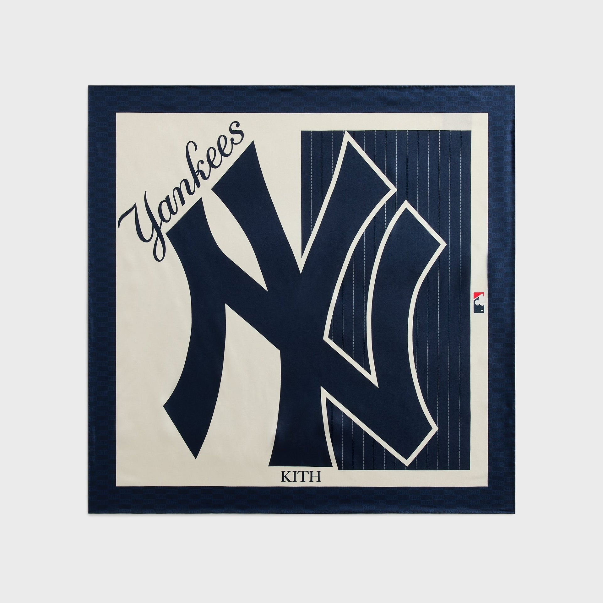 Kith x New York Yankees silk bandana laid flat, showing the Yankees script, NY logo, and pinstripe block
