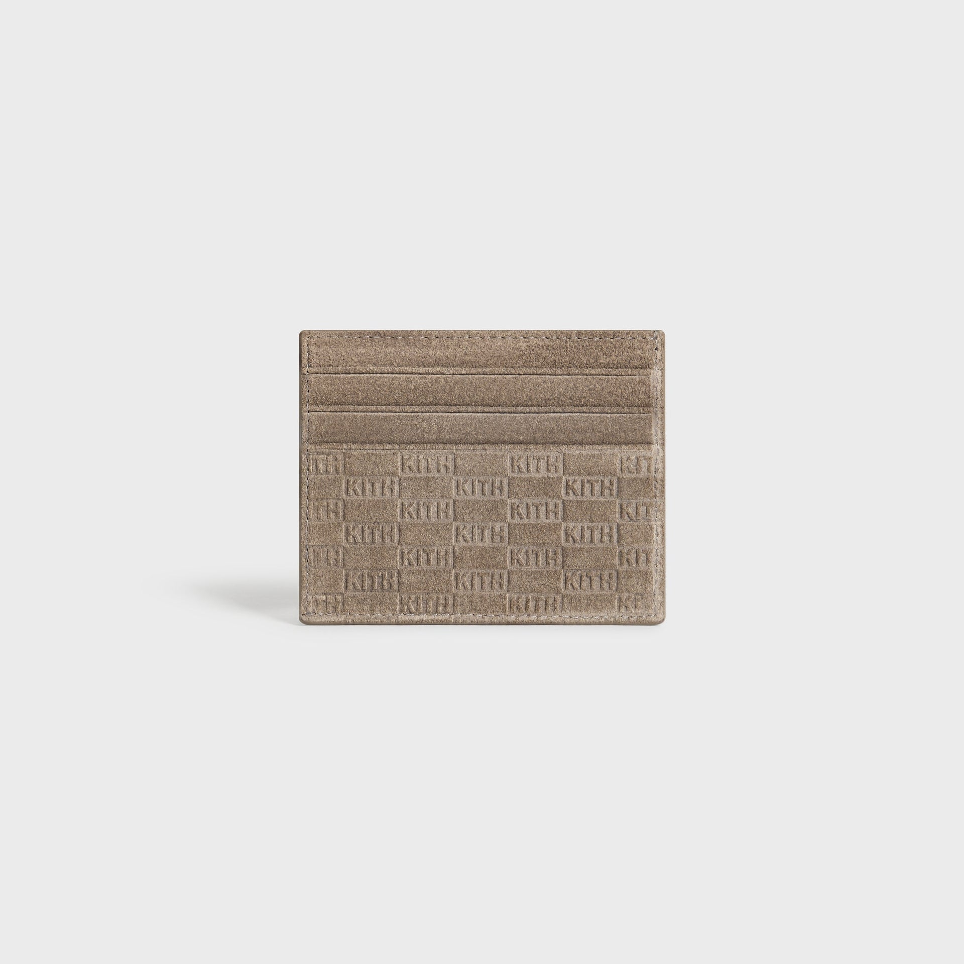 Kith Monogram Suede Cardholder in Java, straight-on packshot highlighting the taupe suede finish and stitched edges
