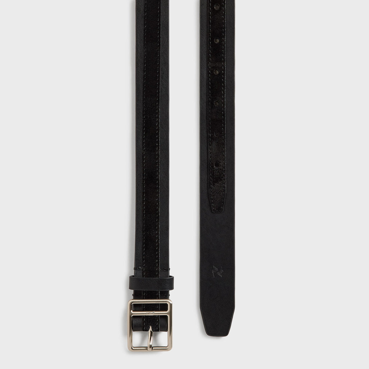 Kith Two-Tone Leather & Suede Belt in black, buckle and tip laid flat