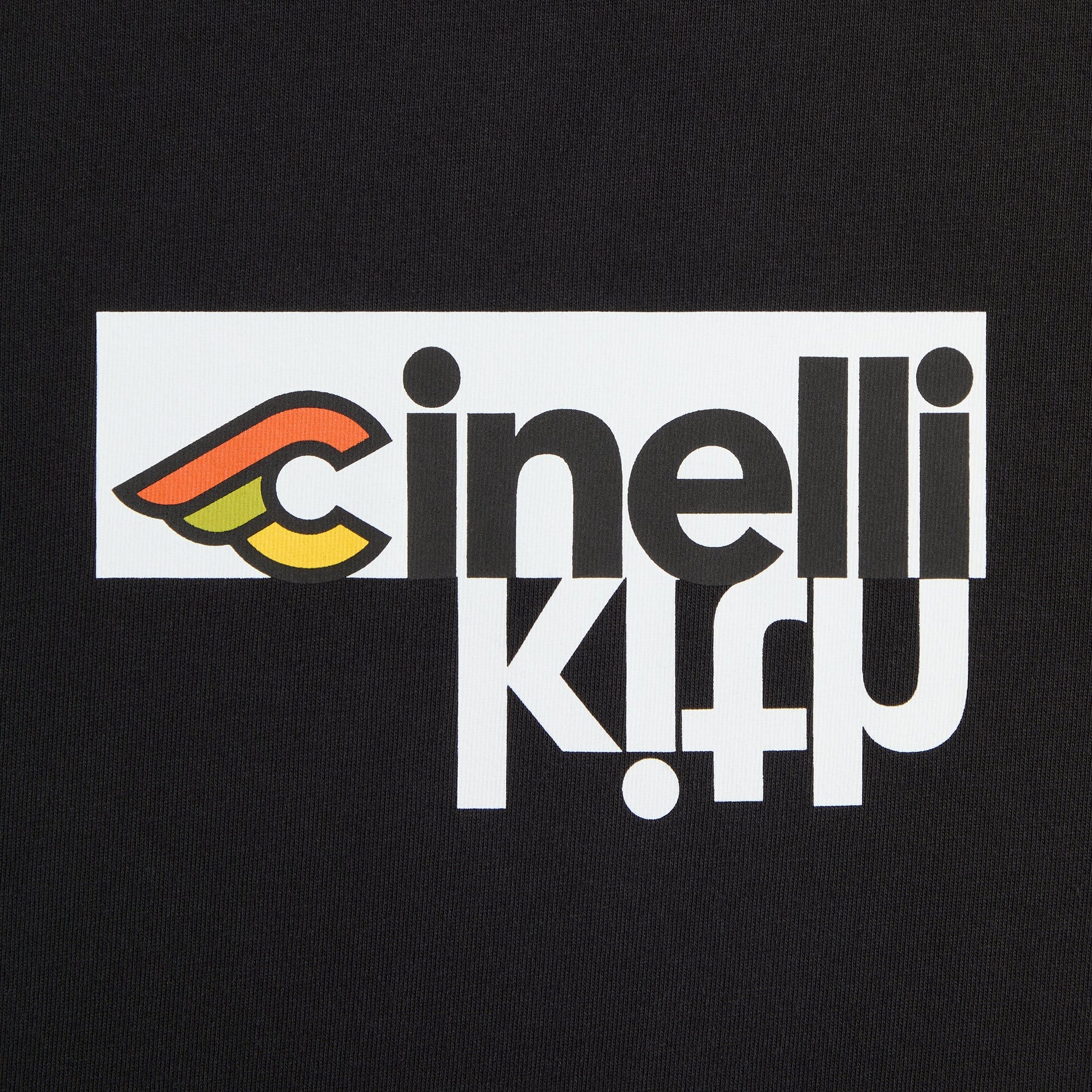Close-up of the Kith for Cinelli chest graphic: Cinelli winged-C logo in a white box with cinelli text and an inverted Kith wordmark beneath