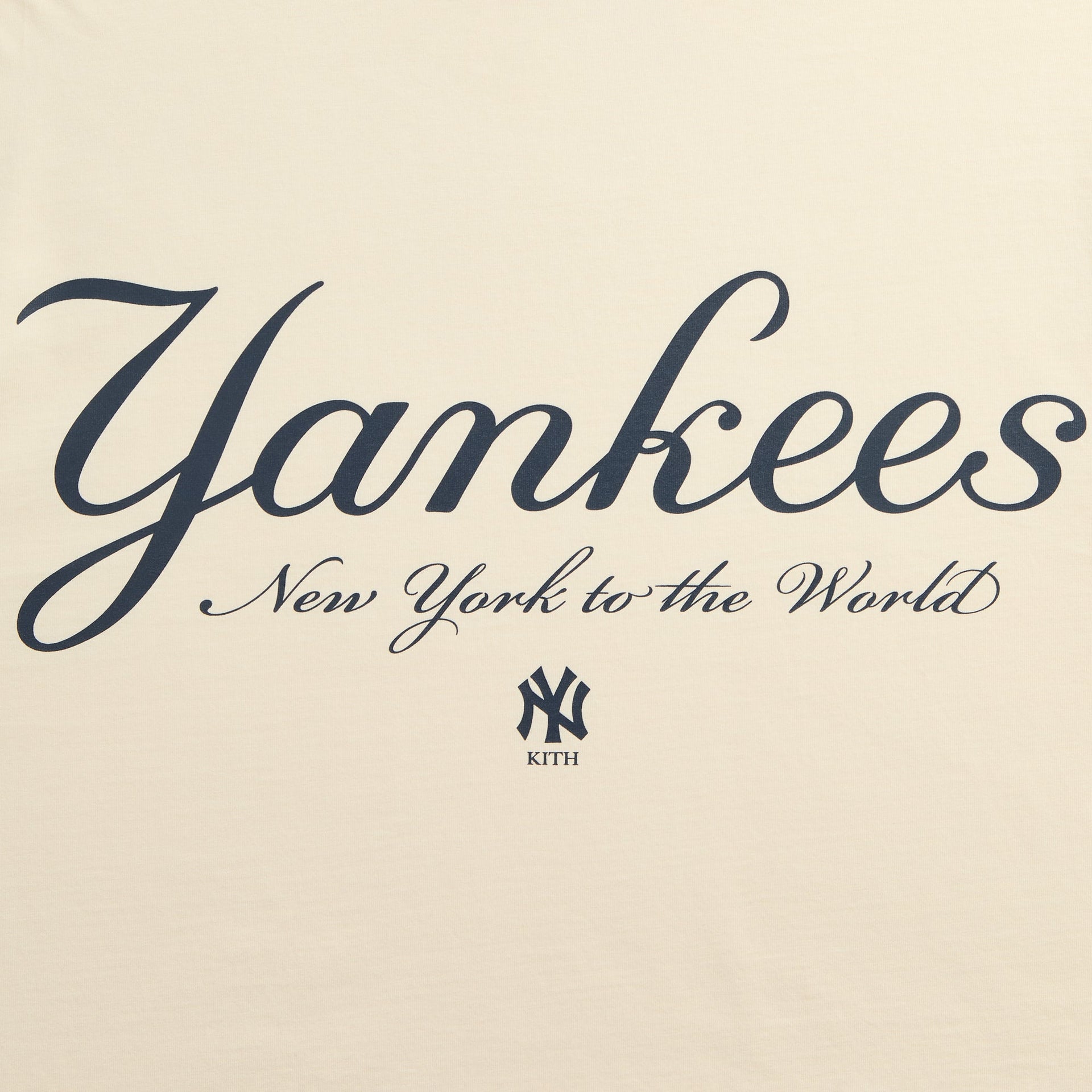 Close-up of Yankees New York to the World script print with NY Kith logo on cream tee