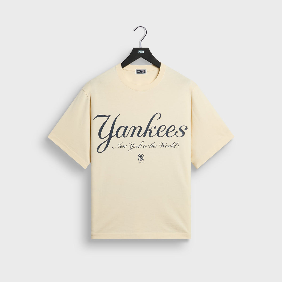 Sandrift cream Kith for New York Yankees tee with Yankees New York to the World script graphic on chest