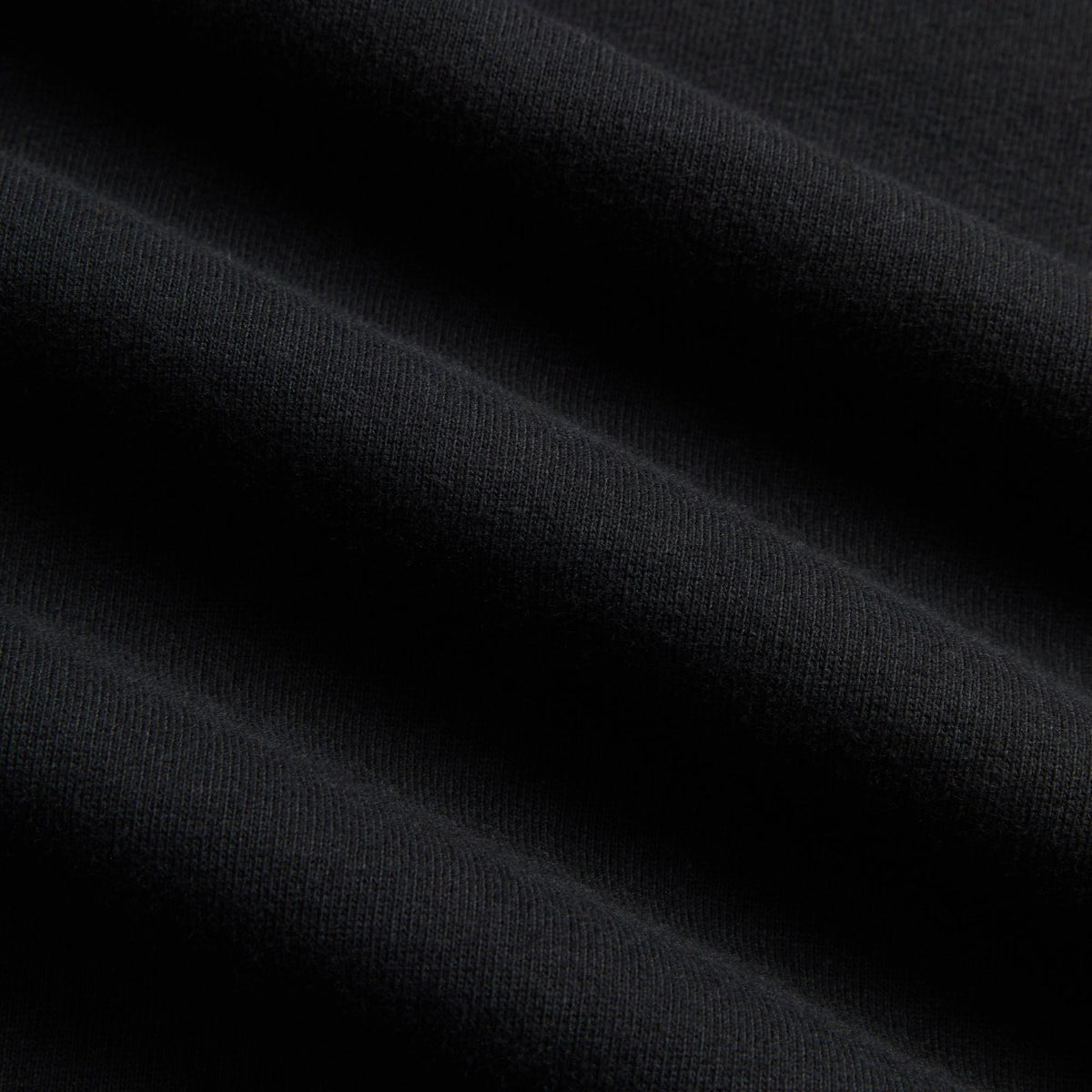 Close-up of black brushed fleece fabric texture, Kith Ivy Emblem Vintage Crewneck