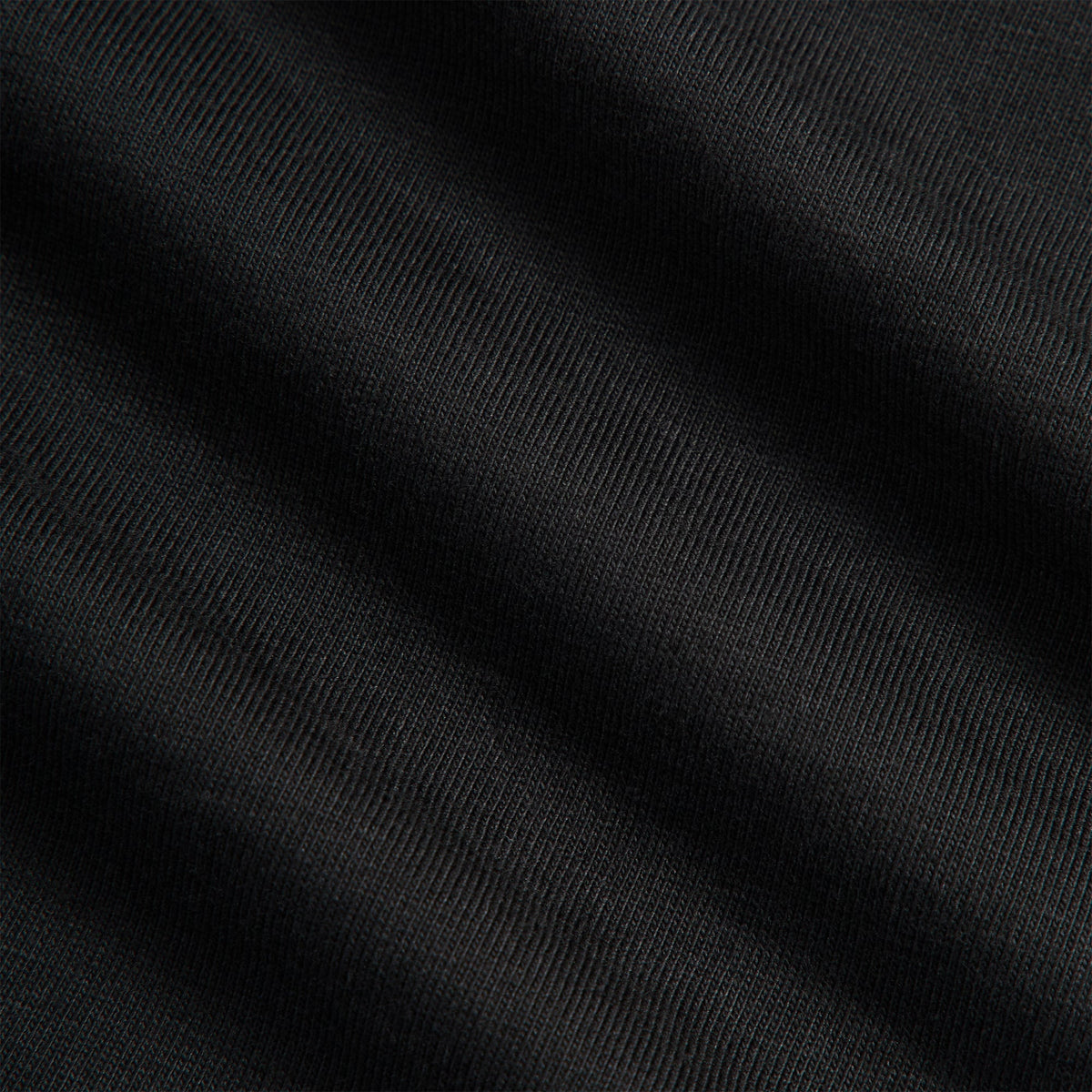 Close-up of black cotton jersey fabric texture, Kith Ivy for Cafe Mogador Pocket Tee