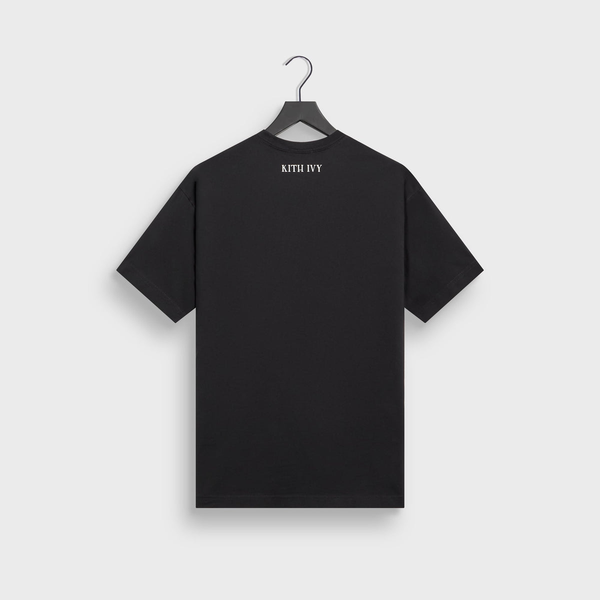 Kith Ivy Classic Logo Tee in black on hanger, back view with small KITH IVY print at neck