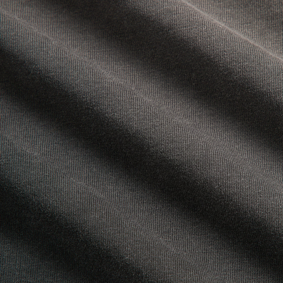 Kith for the Vancouver Grizzlies Vintage Jones II Tee washed black fabric detail showing soft cotton texture and folds
