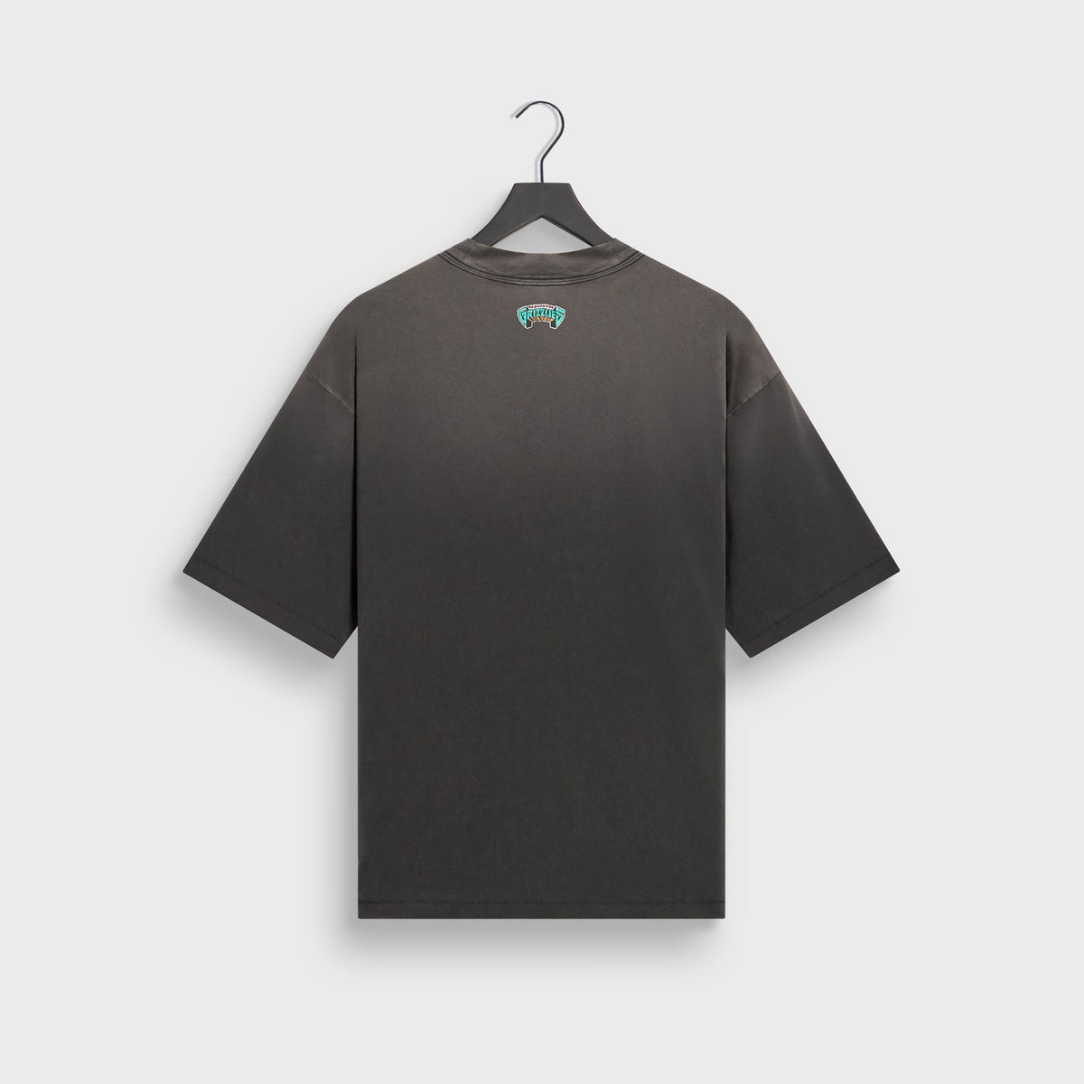 Kith for the Vancouver Grizzlies Vintage Jones II Tee in black with faded wash, back view with small Grizzlies logo below the collar