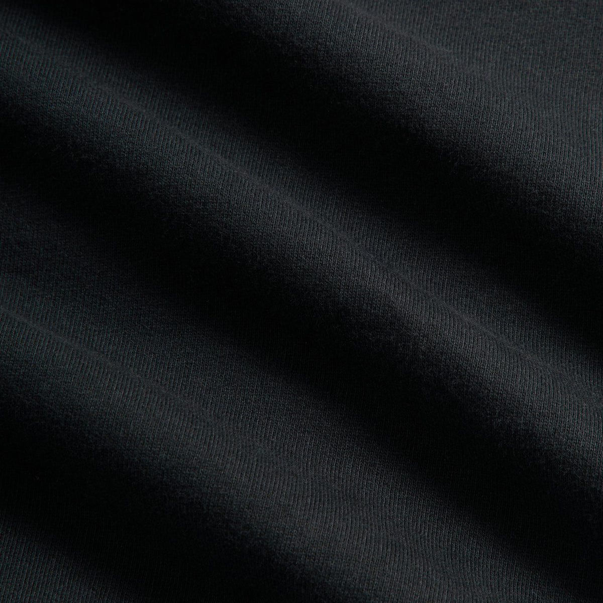 Kith Vancouver Nelson Rugby black fabric detail showing the soft draped heavyweight cotton texture
