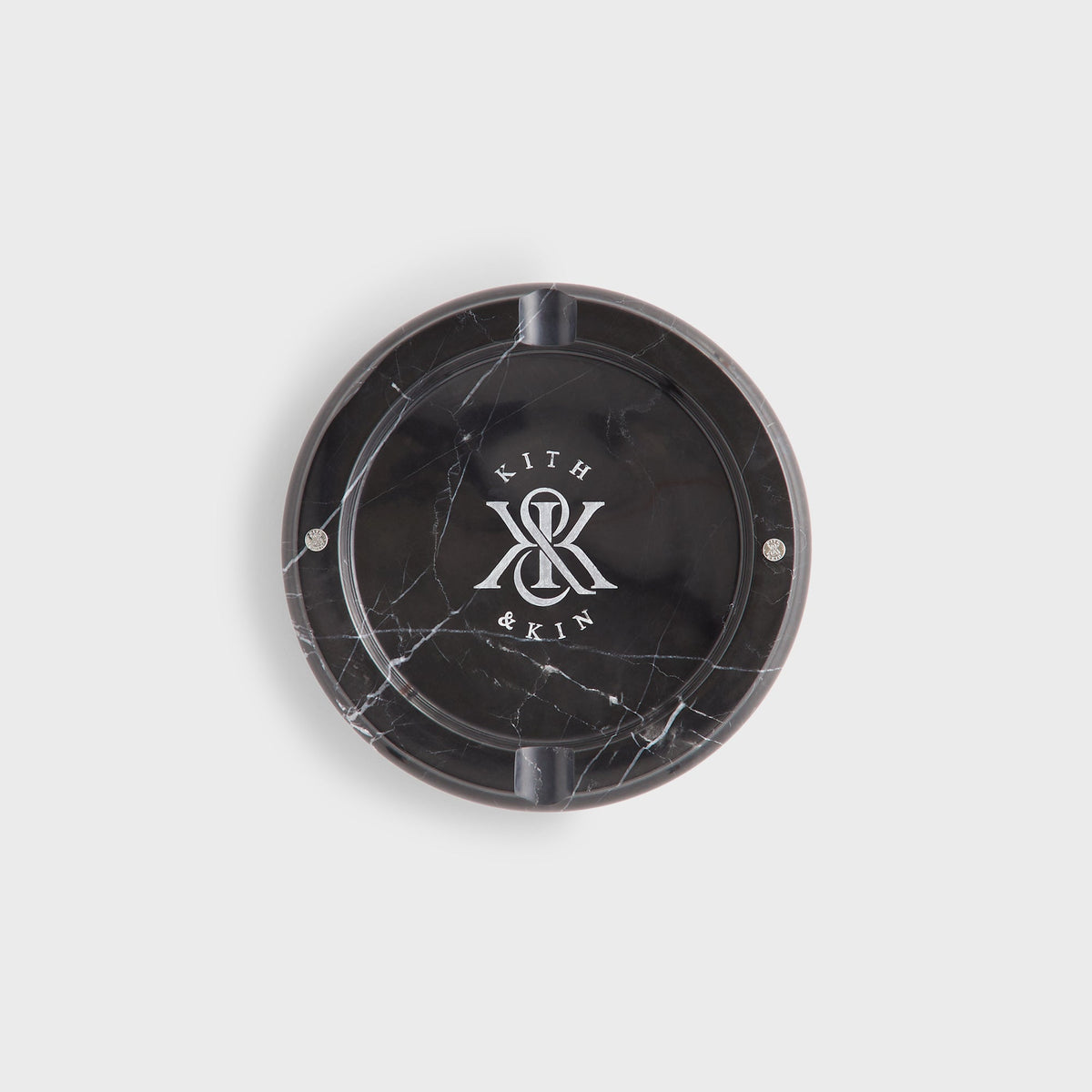 Kith Marble Catchall Tray in black marble, top view of round dish with Kith & Kin logo and white veining