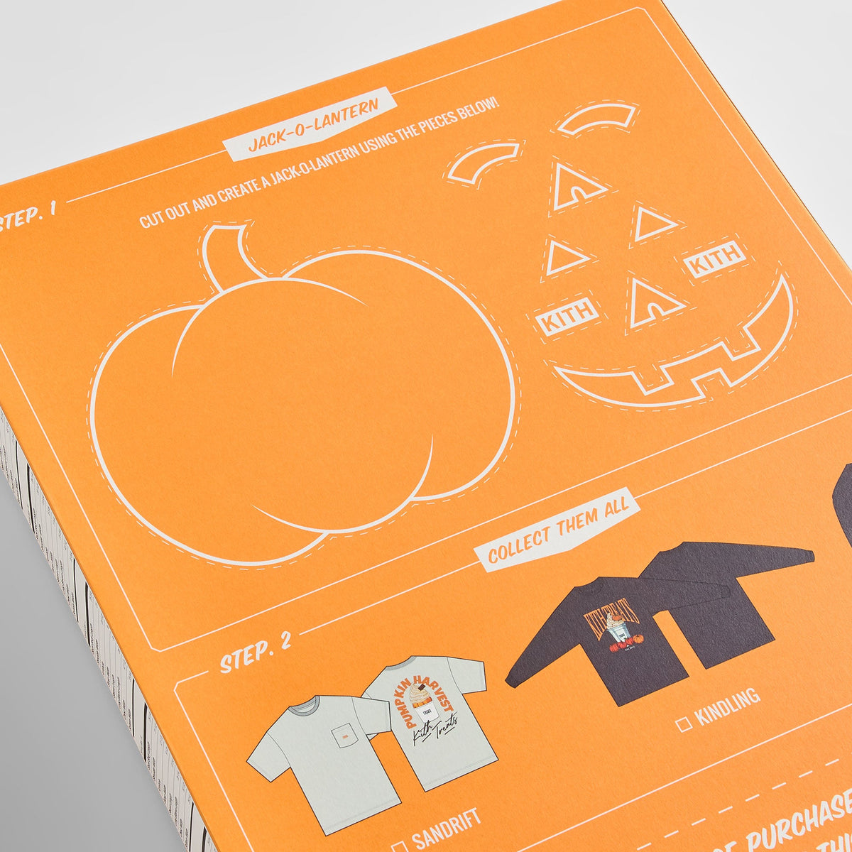 Close-up of Kith Treats Pumpkin Harvest box back showing jack-o'-lantern cut-out pieces and apparel checklist with Kindling tee