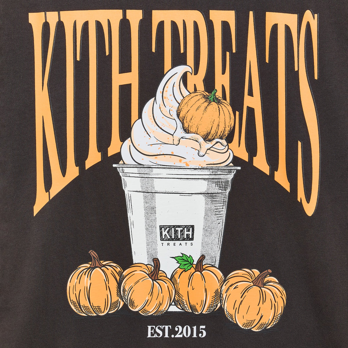 Close-up of Kith Treats Pumpkin Harvest long sleeve front graphic: orange Kith Treats lettering, soft-serve cup, pumpkins, Est. 2015