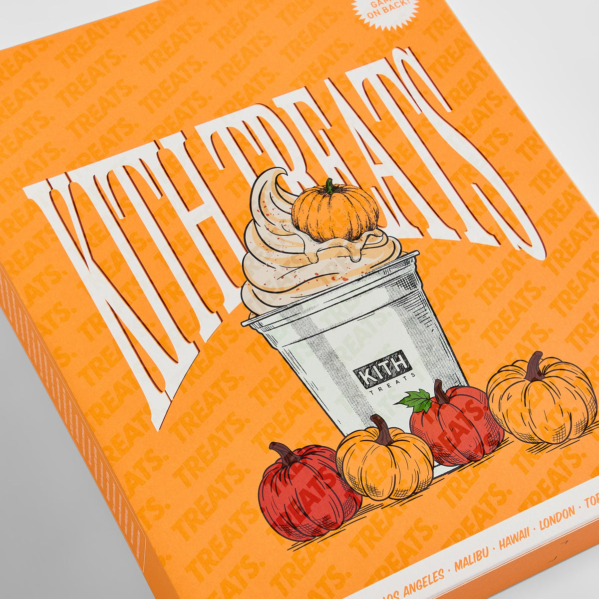 Angled close-up of Kith Treats Pumpkin Harvest box front with Kith Treats lettering, soft-serve cup and pumpkins