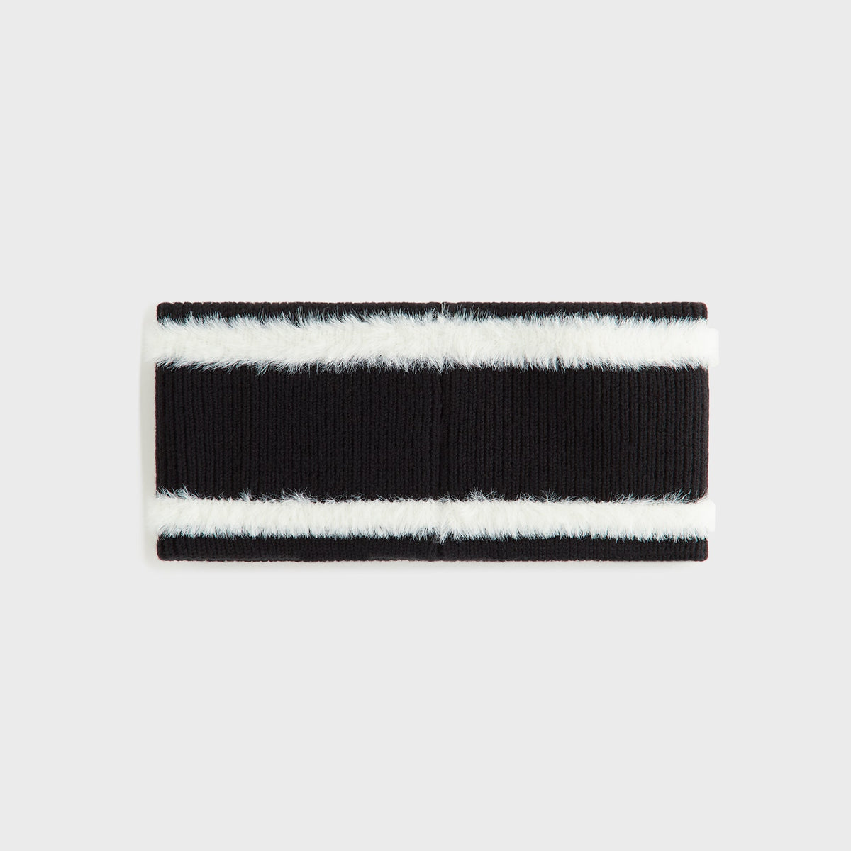Kith Jacquard Rib Headband in black with white fuzzy stripe trim, flat lay back view