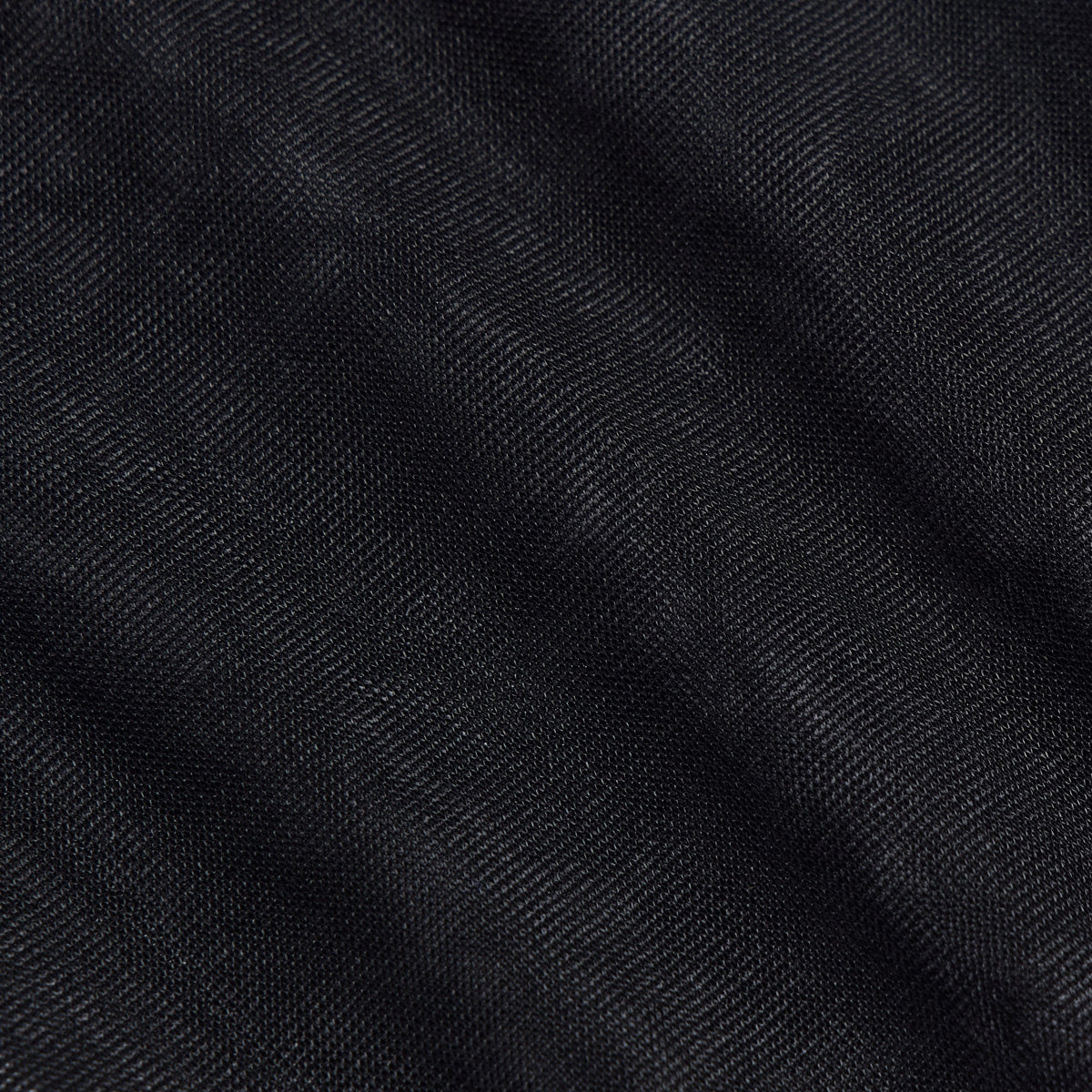 Close-up of the diagonal ribbed knit texture on the black Kith & Kin Line Tights waistband
