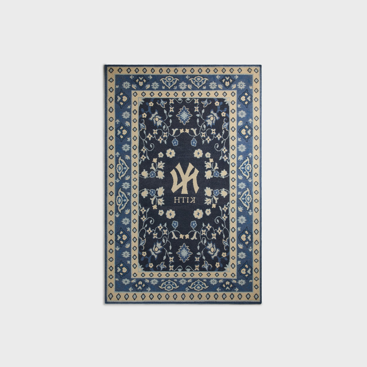 Kith & Kasra Rugs NY Yankees 4x6 rug in Nocturnal, reverse-side view showing mirrored Yankees logo and KITH text
