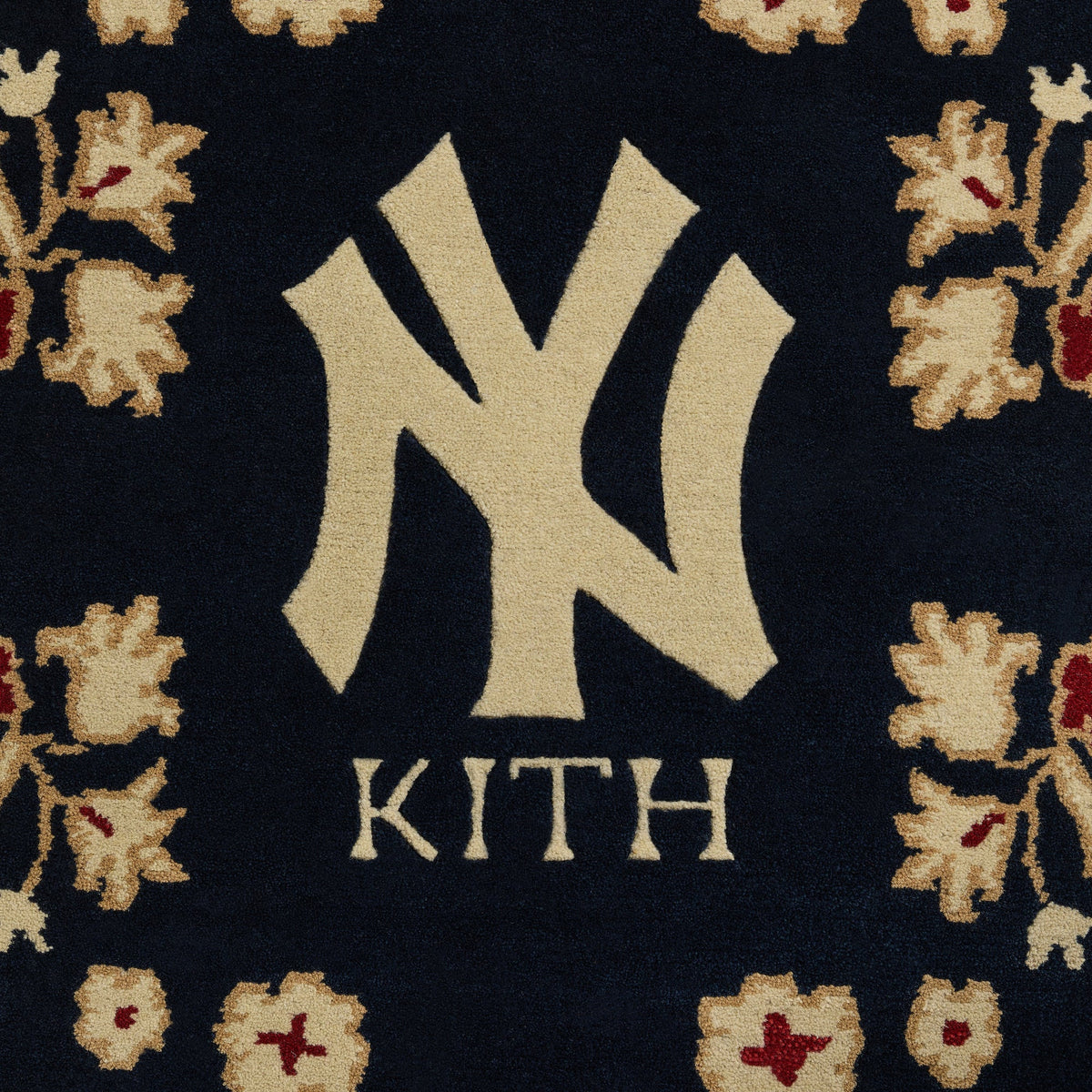 Close-up of NY logo and Kith wordmark woven into the center of the hand-knotted rug