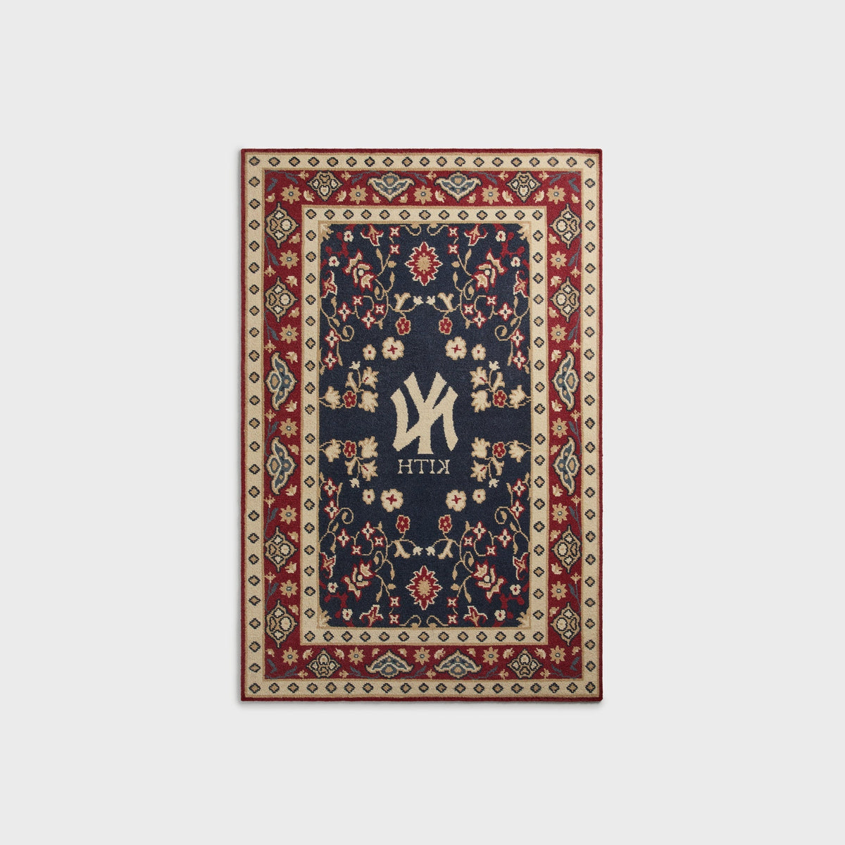 Kith & Kasra Rugs NY Yankees 4x6 rug in Multi, reverse-side view showing mirrored Yankees logo and KITH text
