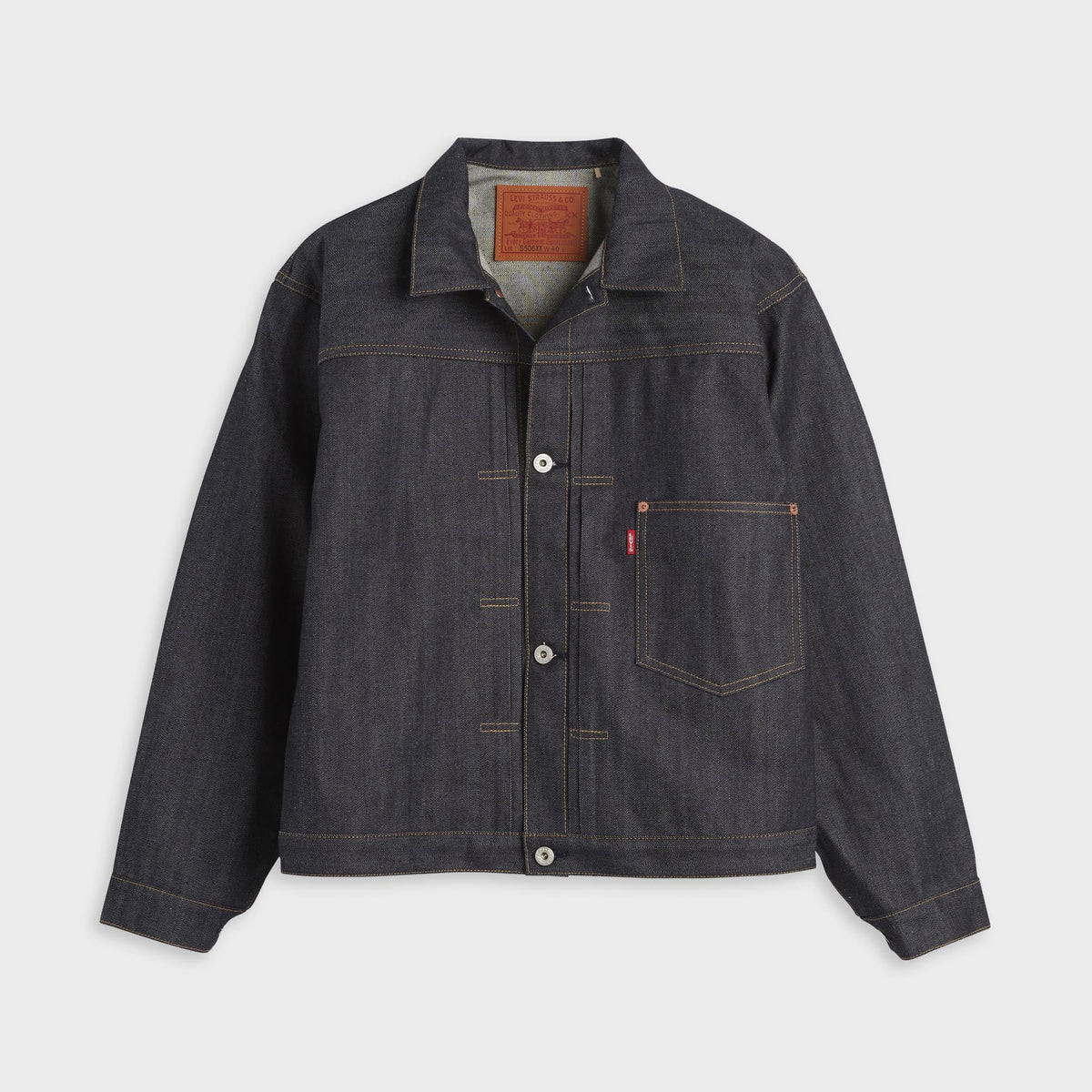 Levi's Vintage Clothing WWII Denim Trucker Jacket in rigid dark wash, front view with button front and chest pocket