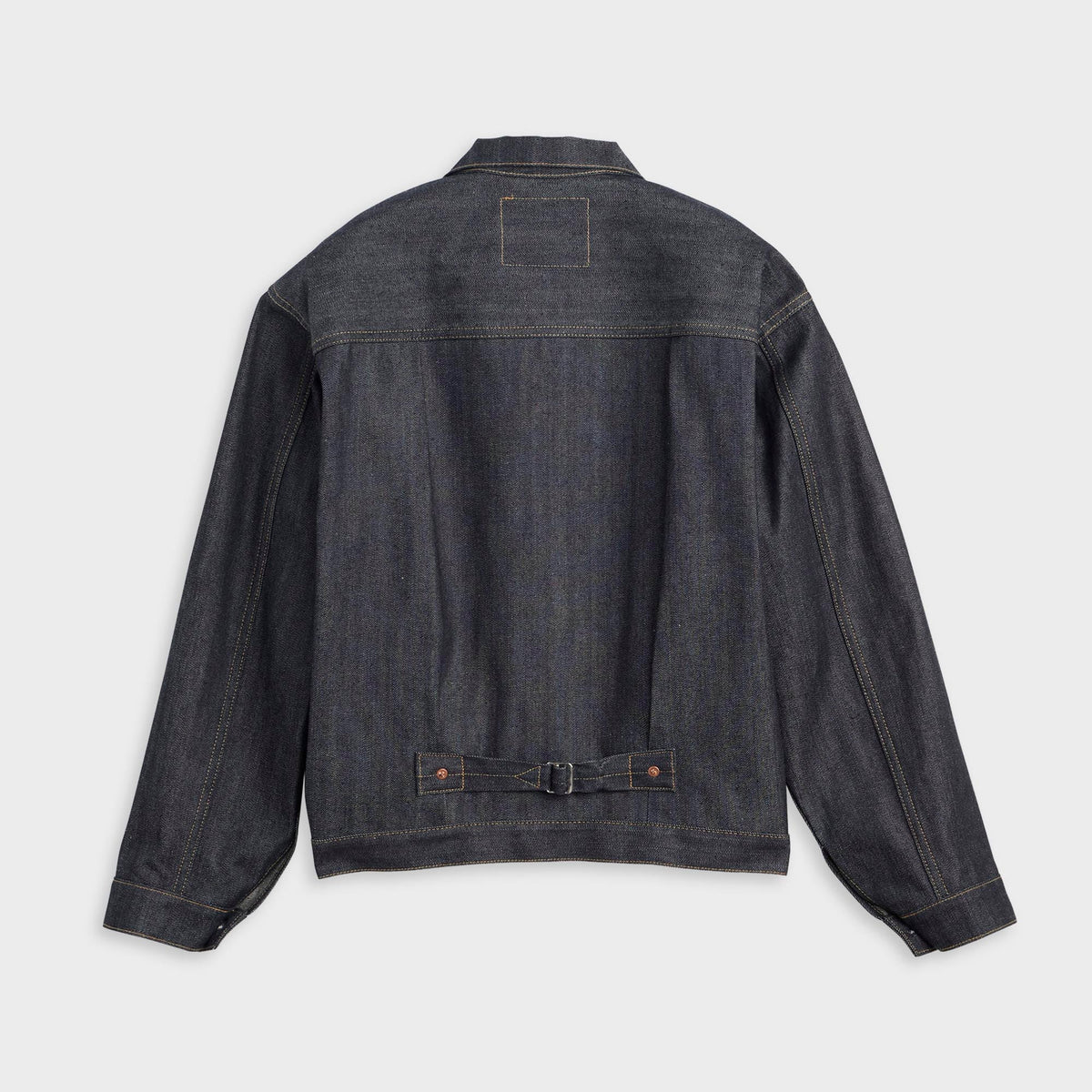 Levi's Vintage Clothing WWII Denim Trucker Jacket in rigid dark wash, back view with buckle cinch strap