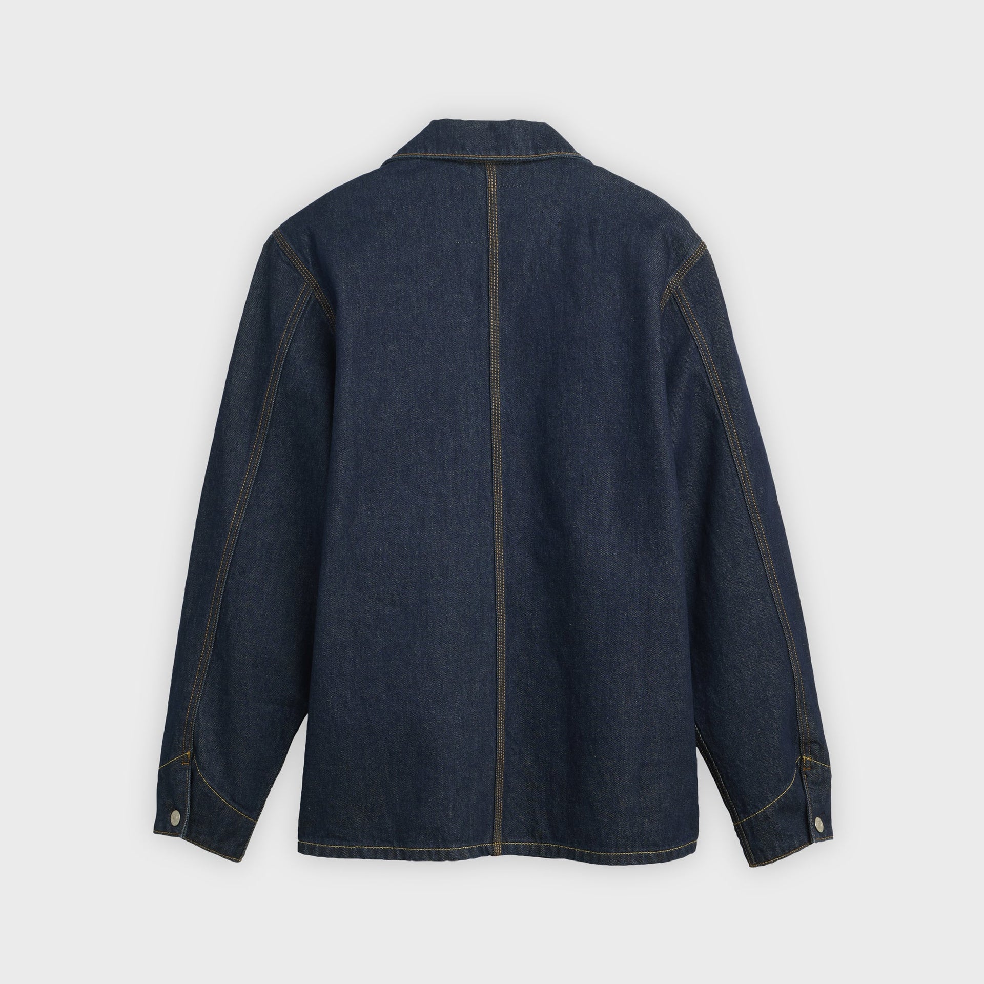 Back view of Levi's x Sky High Farm dark rinse denim chore coat with center seam, gold contrast stitching and buttoned cuffs