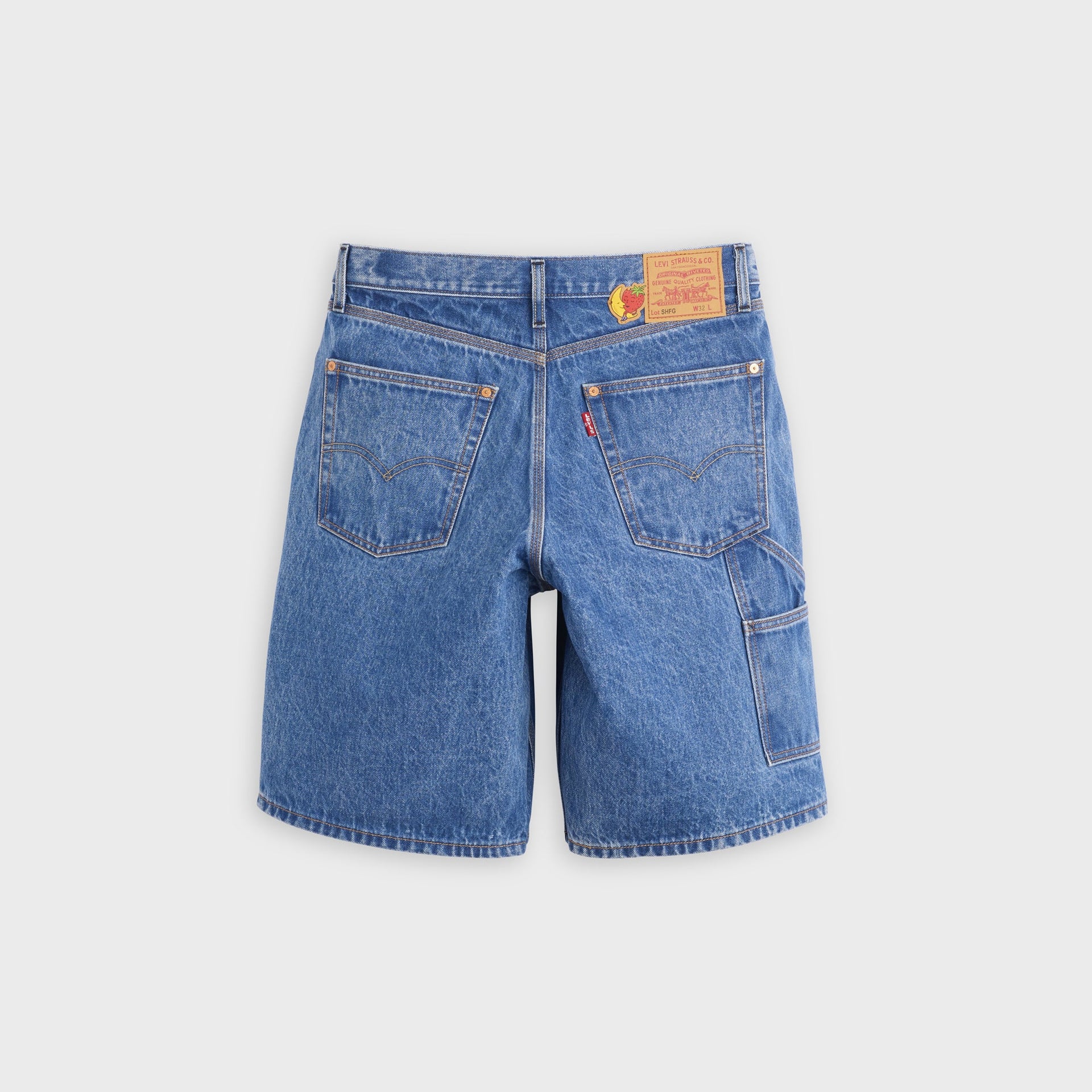 Back view of Levi's x Sky High Farm mid-indigo baggy utility denim shorts with carpenter side loop, red Levi's tab and leather waist patch