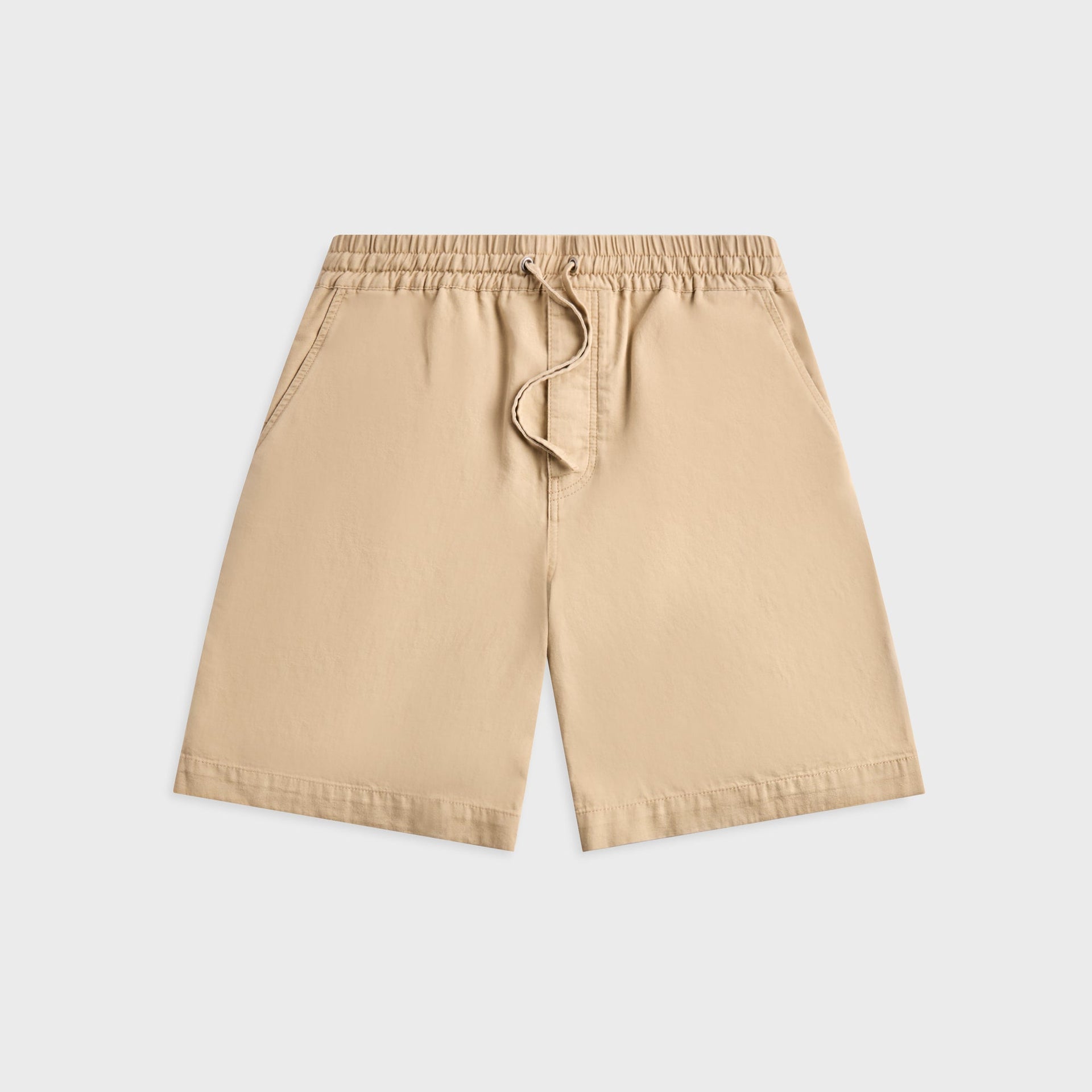 Loewe cotton shorts in beige, front view with elastic drawstring waist and slanted side pockets