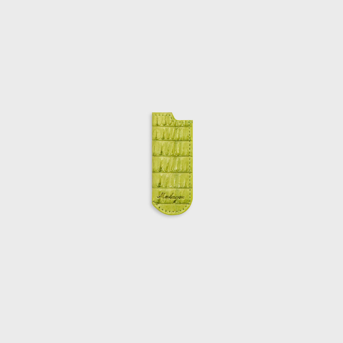 Malagon croc lighter cover in lime green, front view with chunky croc ribs and Malagon script