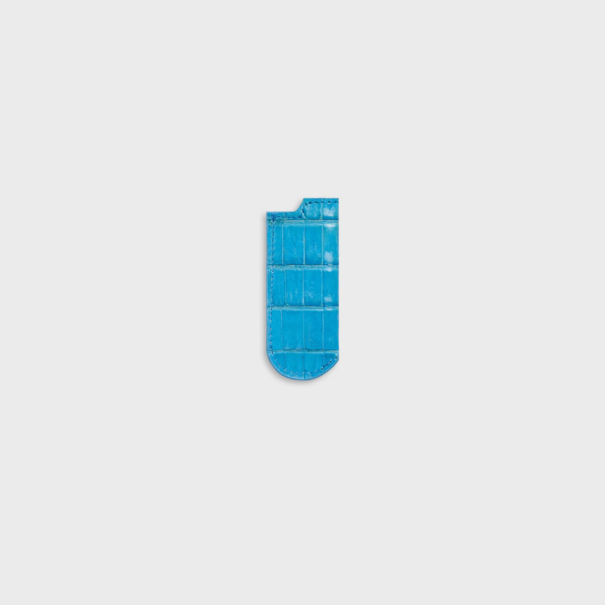 Malagon croc-embossed lighter cover in baby blue, front view with ribbed scales and cutout at top