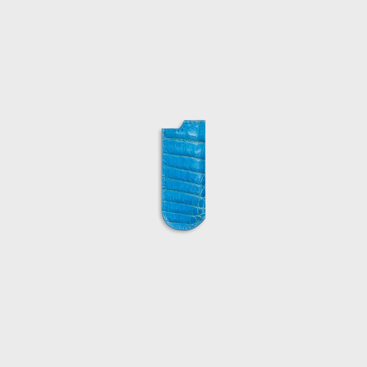 Malagon croc-embossed lighter cover in baby blue, side view showing leather sleeve with stitched edge