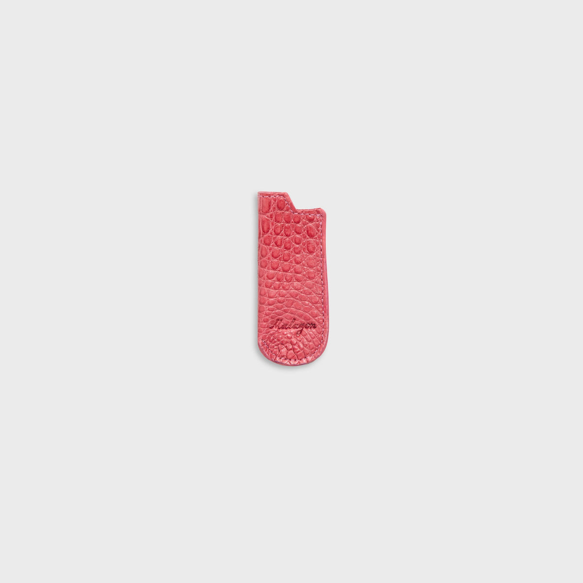 Malagon croc lighter cover in pink, front view with croc scales and Malagon script at base