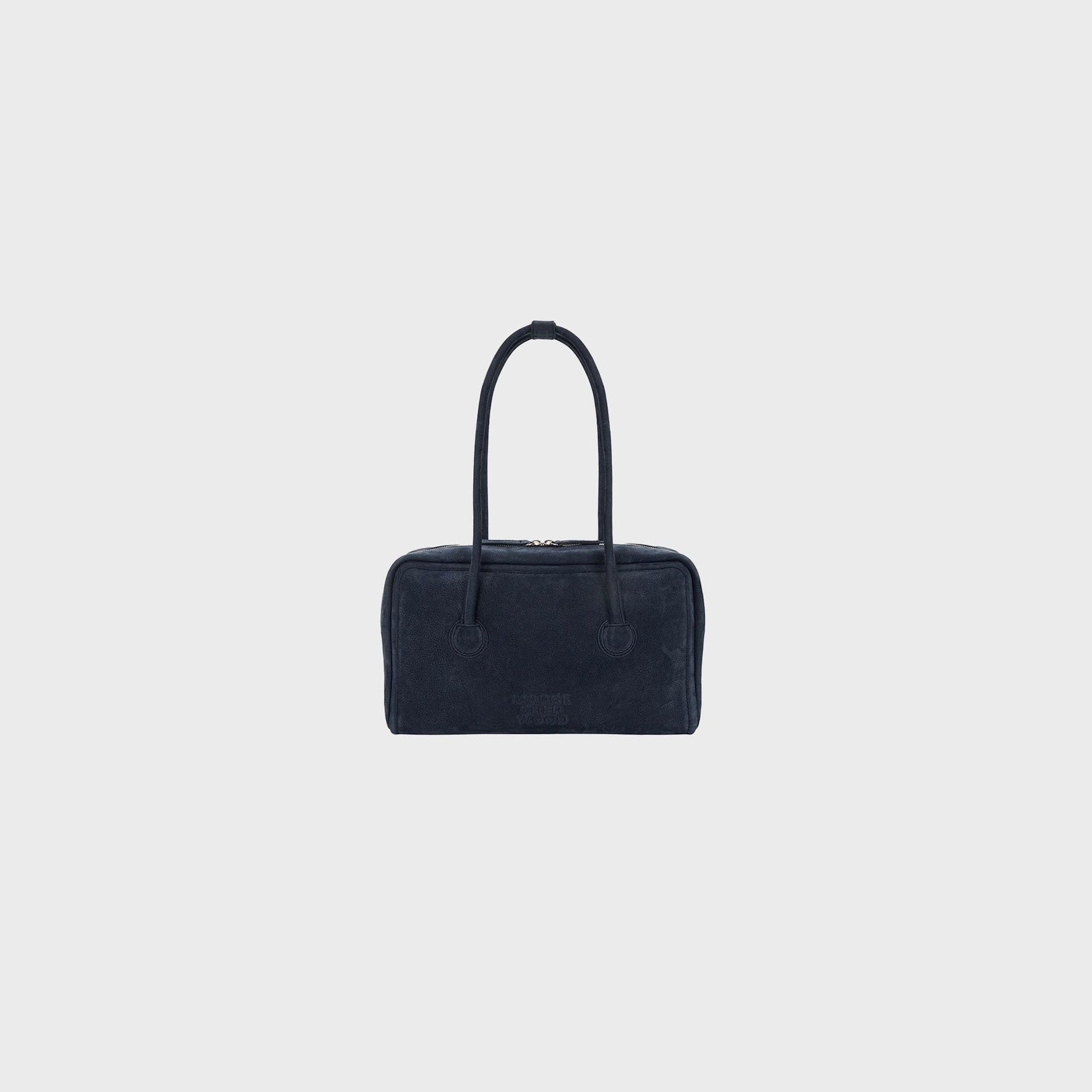 MARGESHERWOOD soft Boston bag in indigo nubuck, front view with dual handles, zip top and embossed logo
